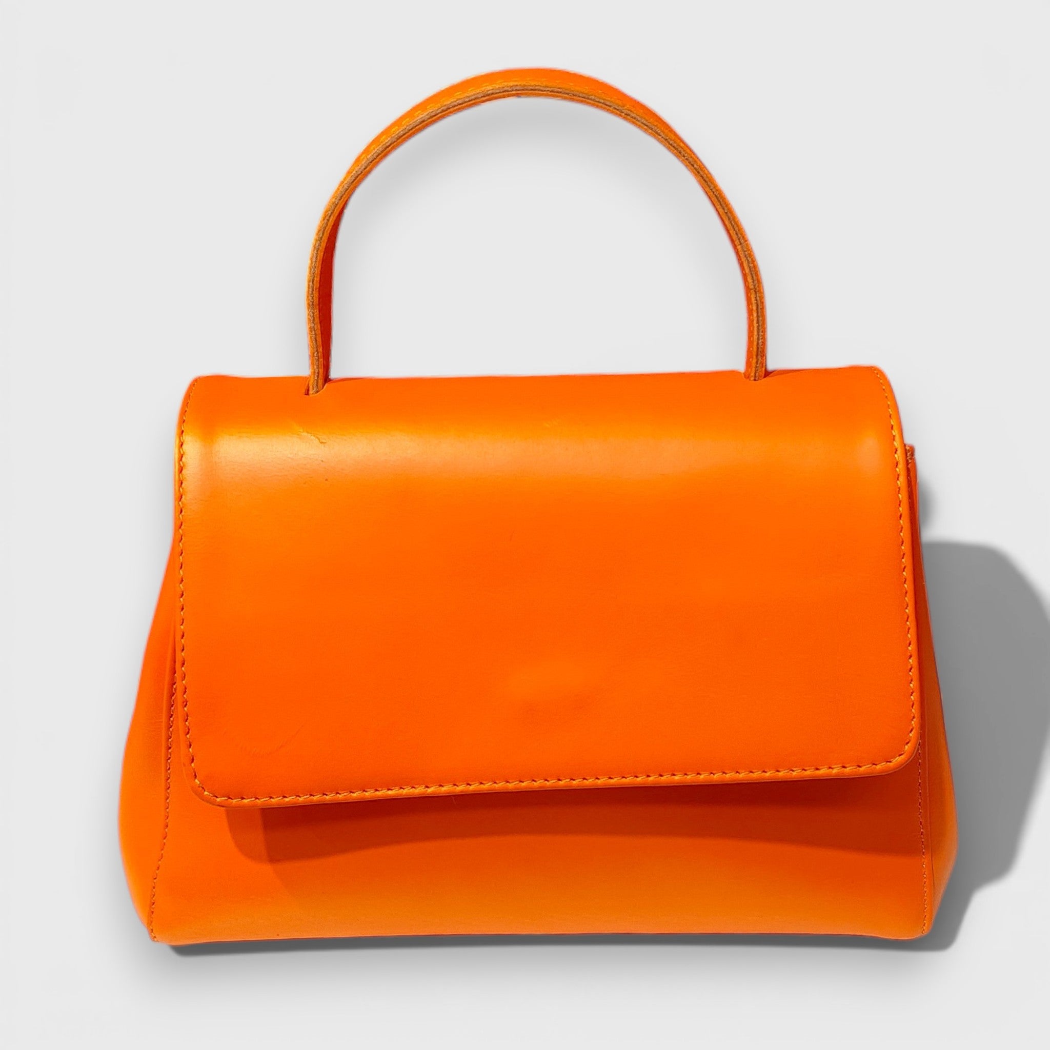 Pelletteria Pelle Nuda Milano, Artigianato Italiano, Vera pelle, Negozio borse donna, Amor arancione