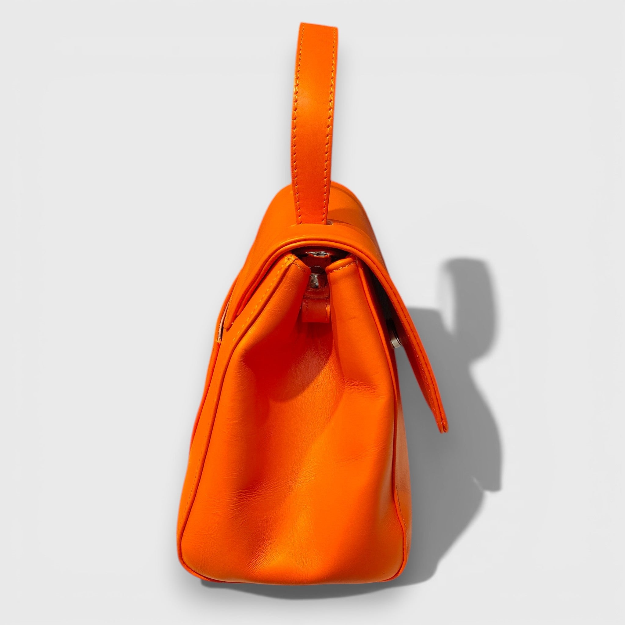 Pelletteria Pelle Nuda Milano, Artigianato Italiano, Vera pelle, Negozio borse donna, Amor arancione