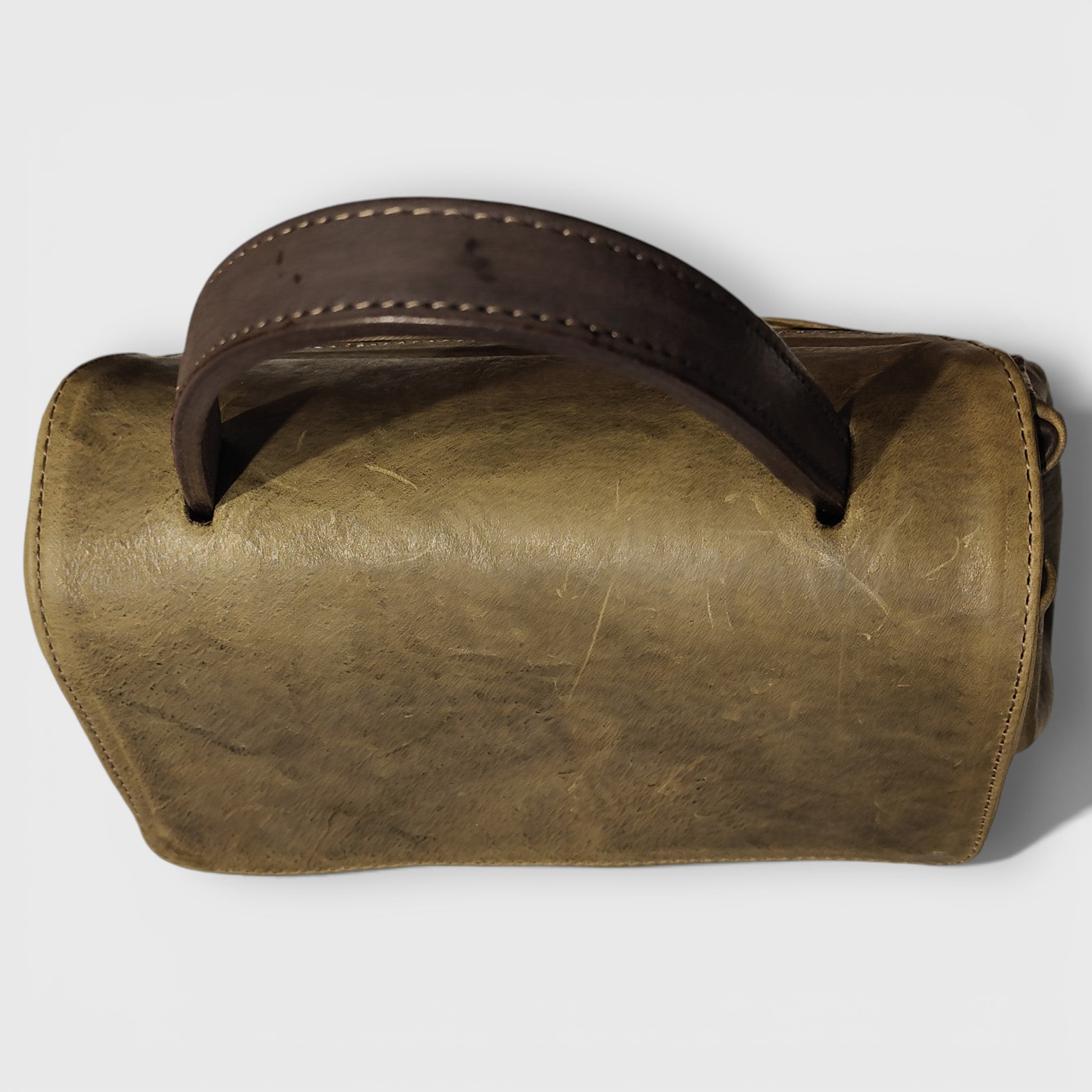 AMOR in green greased leather