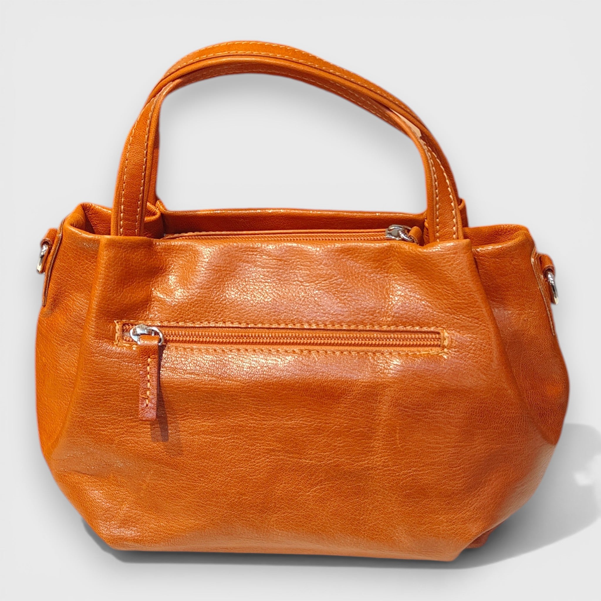 Pelletteria Pelle Nuda Milano, Artigianato Italiano, Vera pelle, Negozio borse donna, Andrea arancione