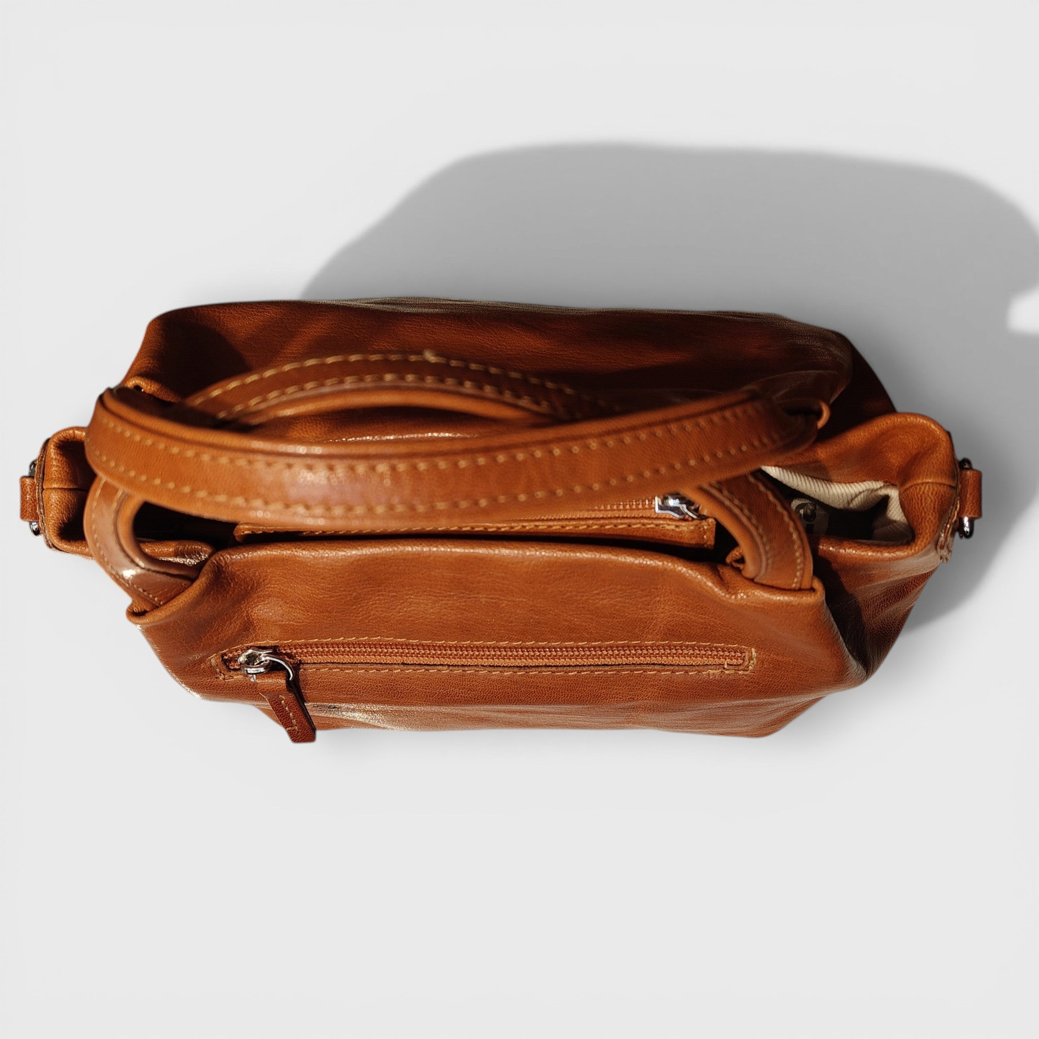 Pelletteria Pelle Nuda Milano, Artigianato Italiano, Vera pelle, Negozio borse donna, Andrea arancione