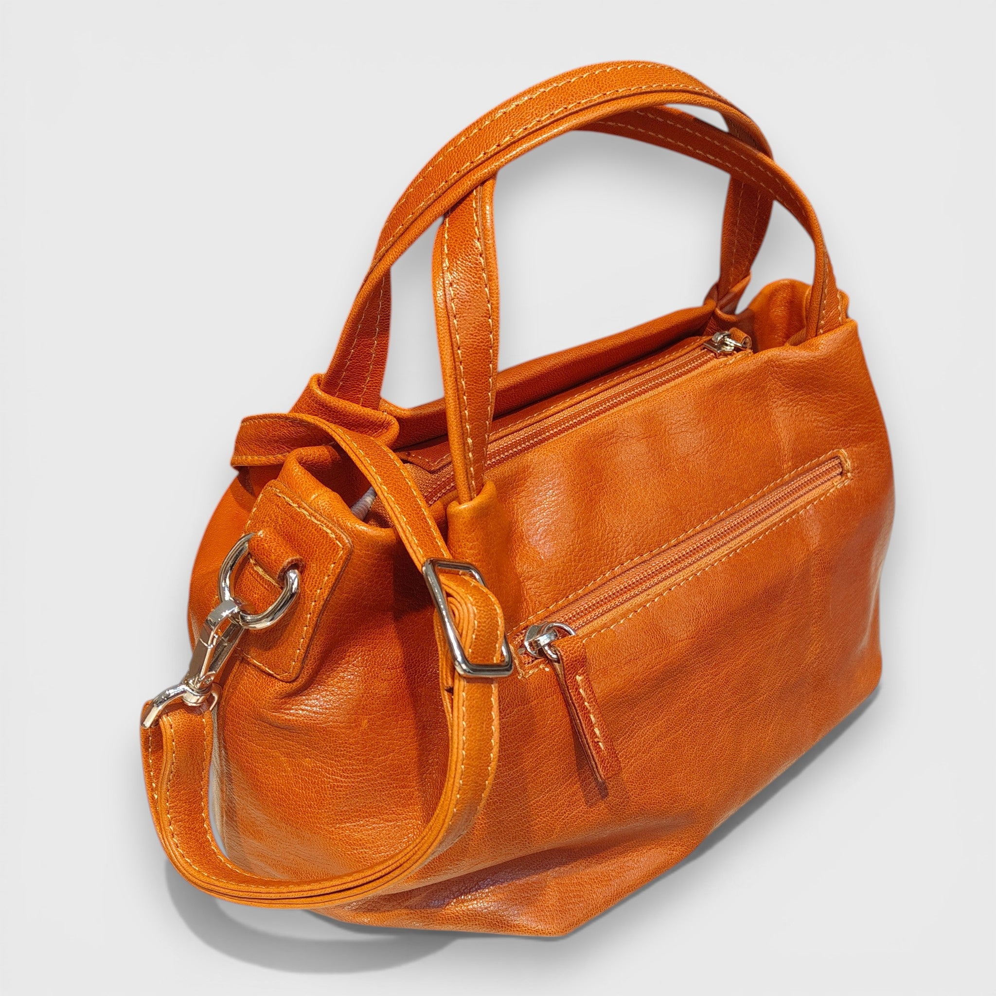 Pelletteria Pelle Nuda Milano, Artigianato Italiano, Vera pelle, Negozio borse donna, Andrea arancione