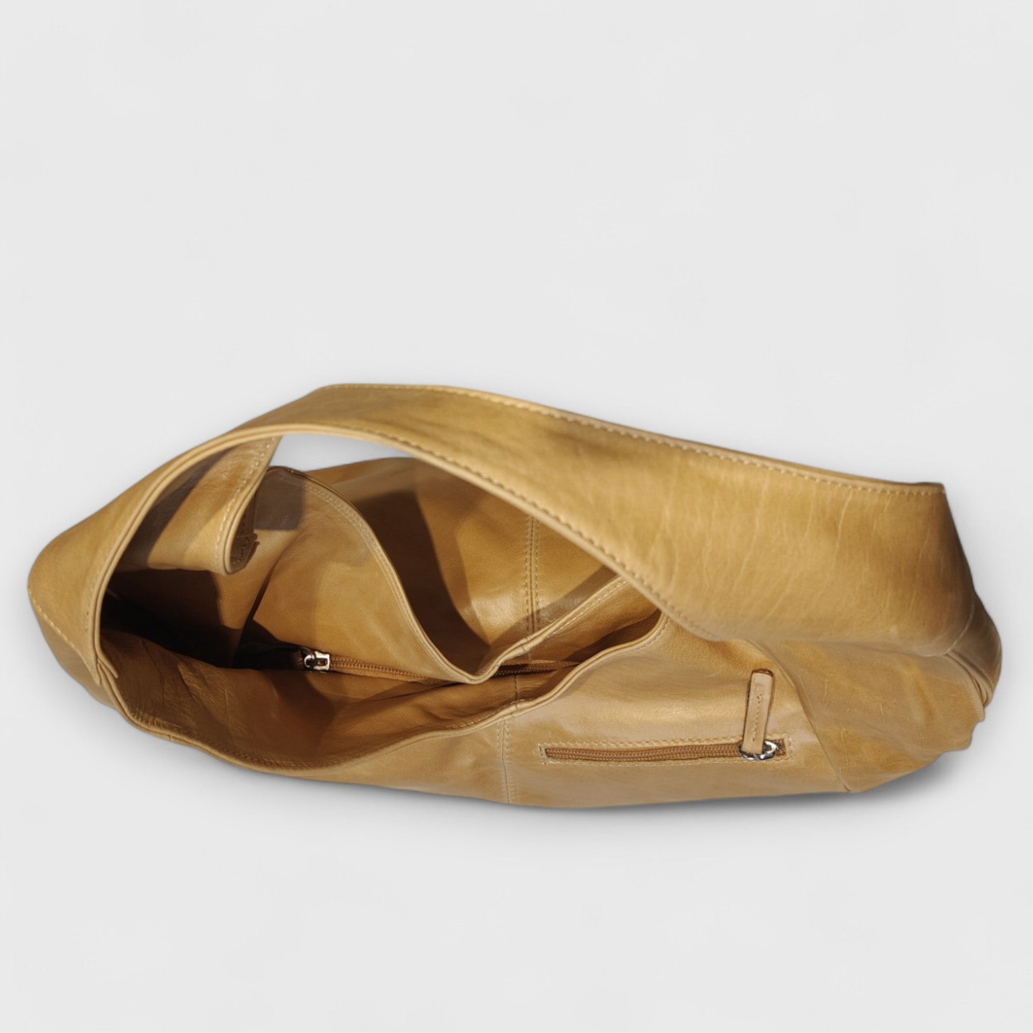 Pelletteria Pelle Nuda Milano, Artigianato Italiano, Vera Pelle, Negozio borse donna, Barchetta cuoio naturale