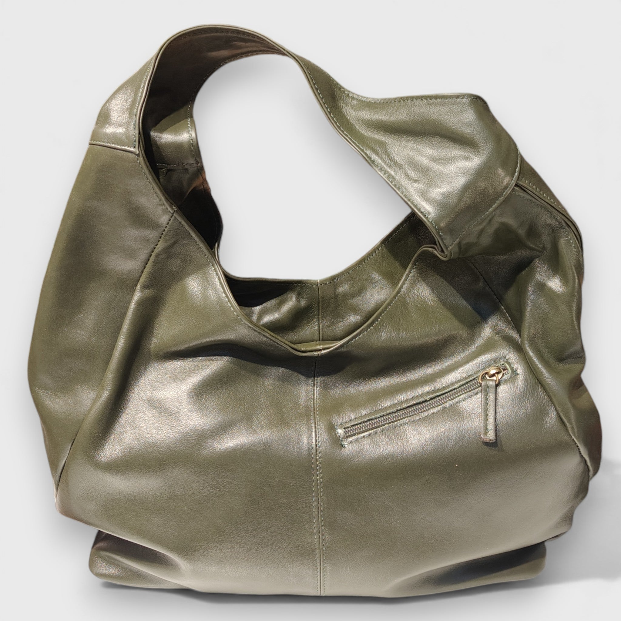 Pelletteria Pelle Nuda Milano, Artigianato Italiano, Vera pelle, Negozio borse donna, Barchetta verde