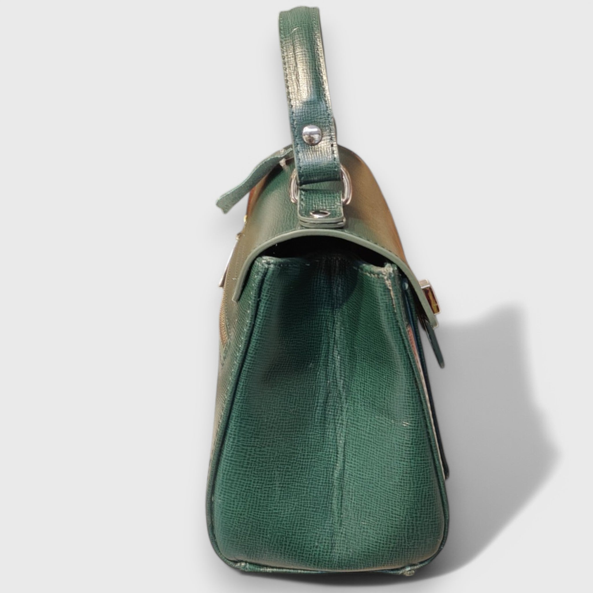 Pelletteria Pelle Nuda Milano, artigianato italiano, vera pelle, negozio borse donna, Bomboniera Alda verde