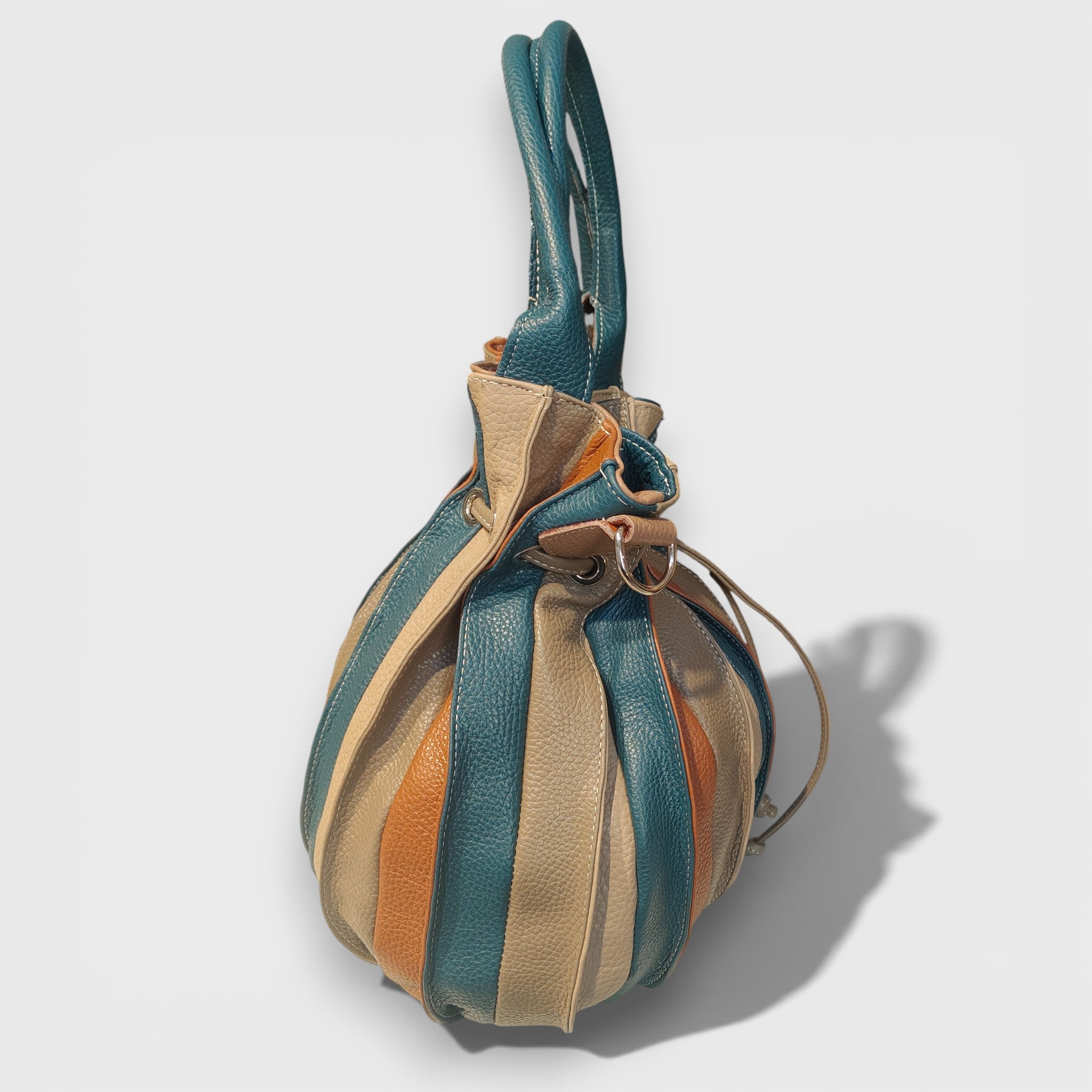 Pelletteria Pelle Nuda Milano, Artigianato Italiano, Vera pelle, Negozio borse donna, Caramella marrone-blu