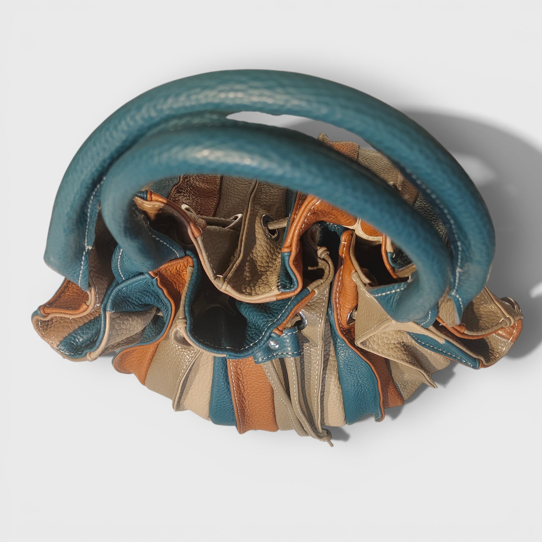 Pelletteria Pelle Nuda Milano, Artigianato Italiano, Vera pelle, Negozio borse donna, Caramella marrone-blu