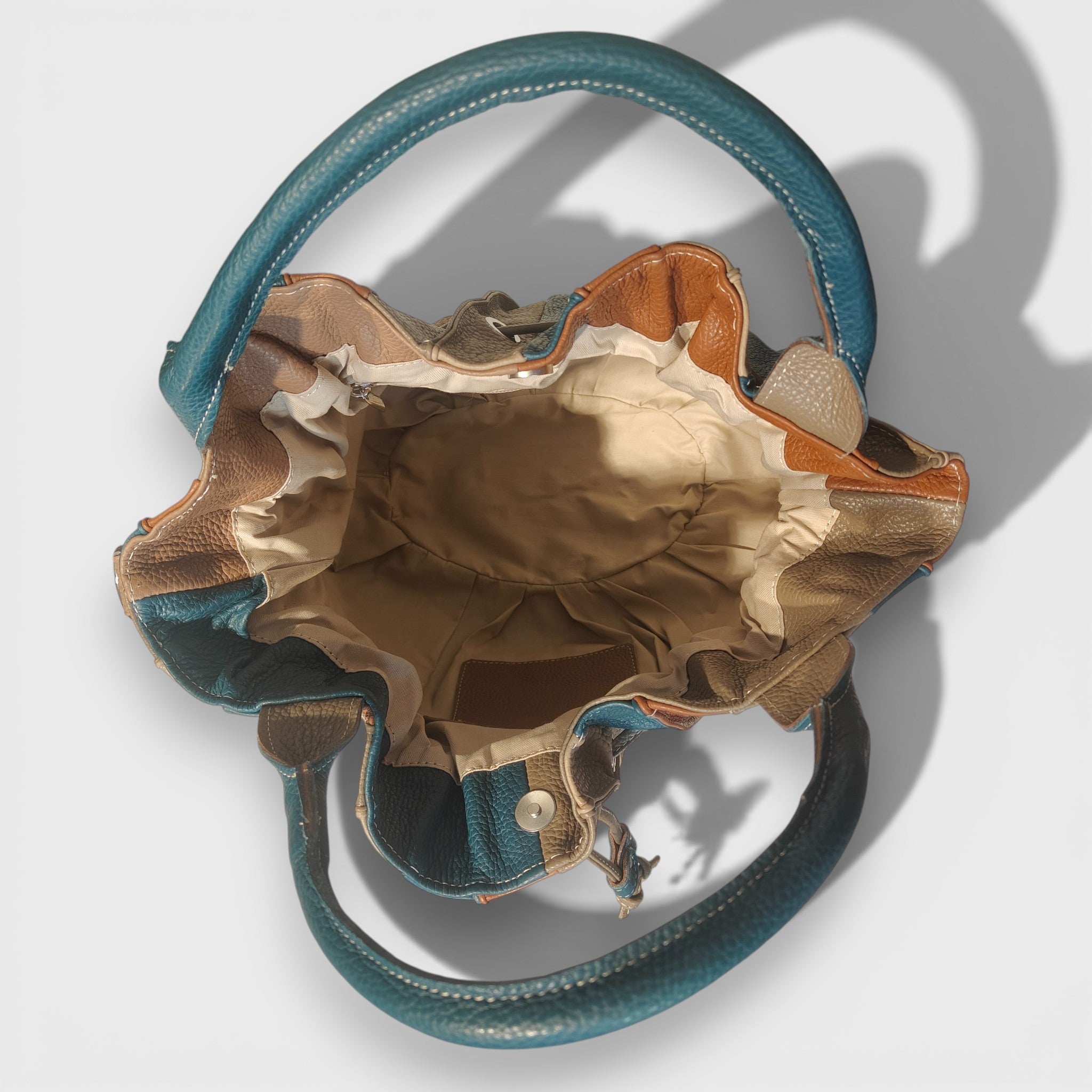 Pelletteria Pelle Nuda Milano, Artigianato Italiano, Vera pelle, Negozio borse donna, Caramella marrone-blu