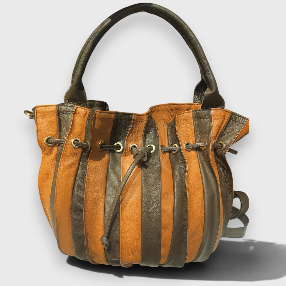 Pelletteria Pelle Nuda Milano, vera pelle italiana, Negozio borse donna, Caramella verde marrone