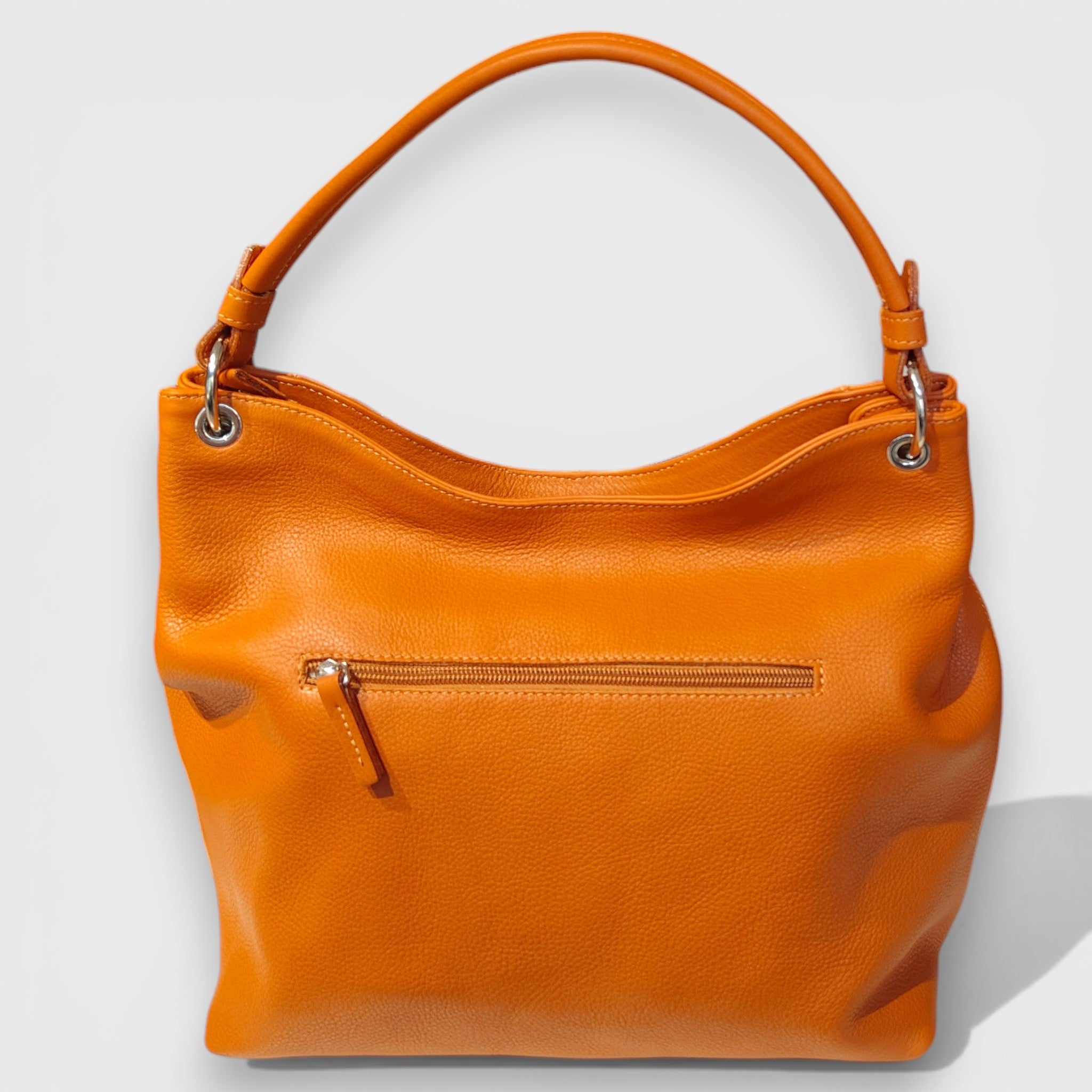 Pelletteria Pelle Nuda Milano, Artigianato Italiano, Vera Pelle, Negozio borse donna, Cris arancione