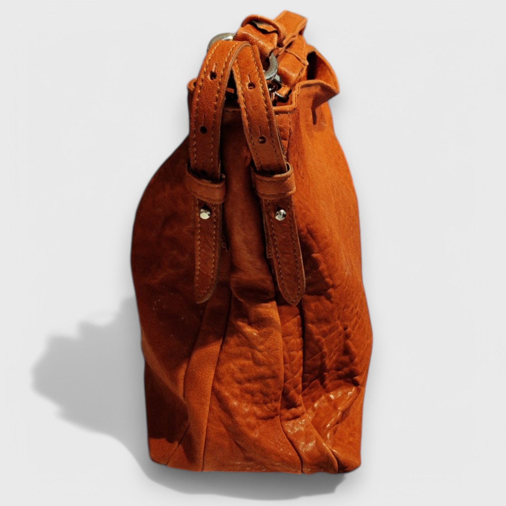 Pelletteria Pelle Nuda Milano, Artigianato italiano, vera pelle, Negozio borse donna, Monica arancione