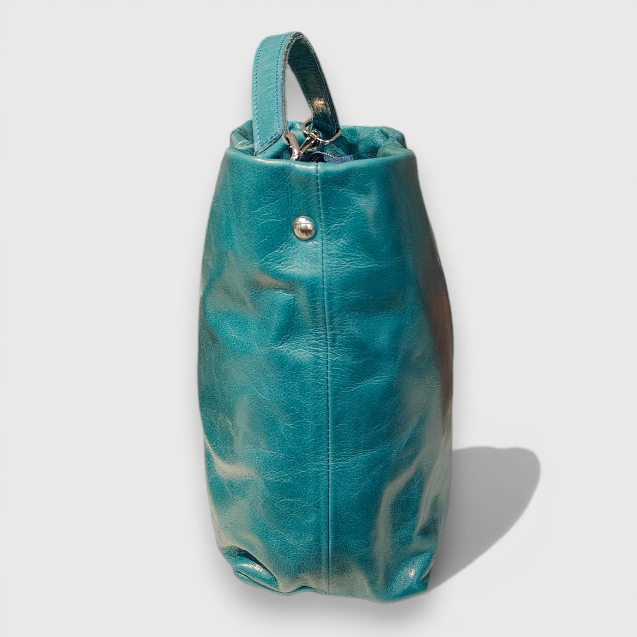 Pelletteria Pelle Nuda Milano, Artigianato Italiano, Vera Pelle, Negozio Borse donna, Sara petrolio