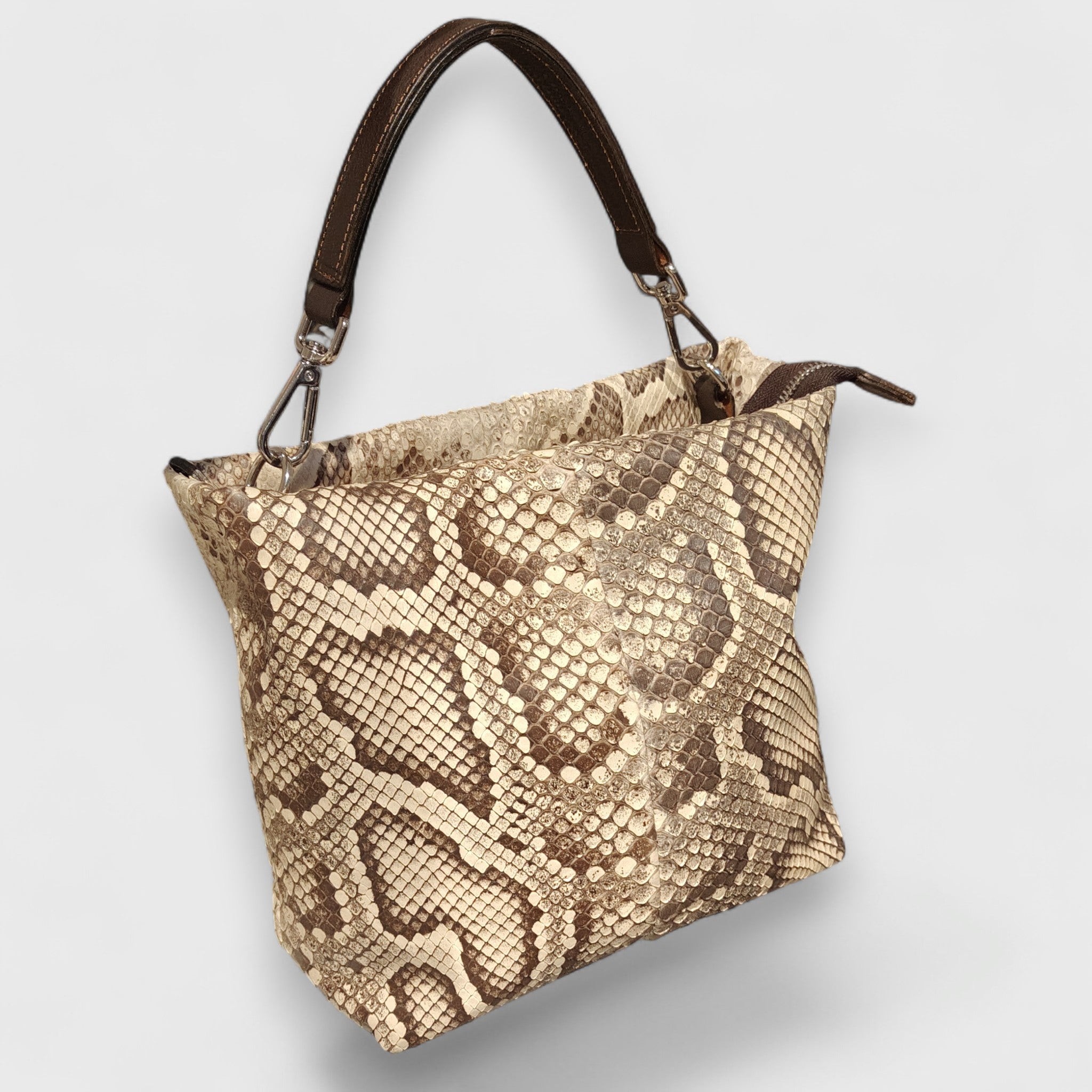 Pelletteria Pelle Nuda Milano, Artigianato Italiano, Vera pelle, Negozio Borse donna, Sara pitone