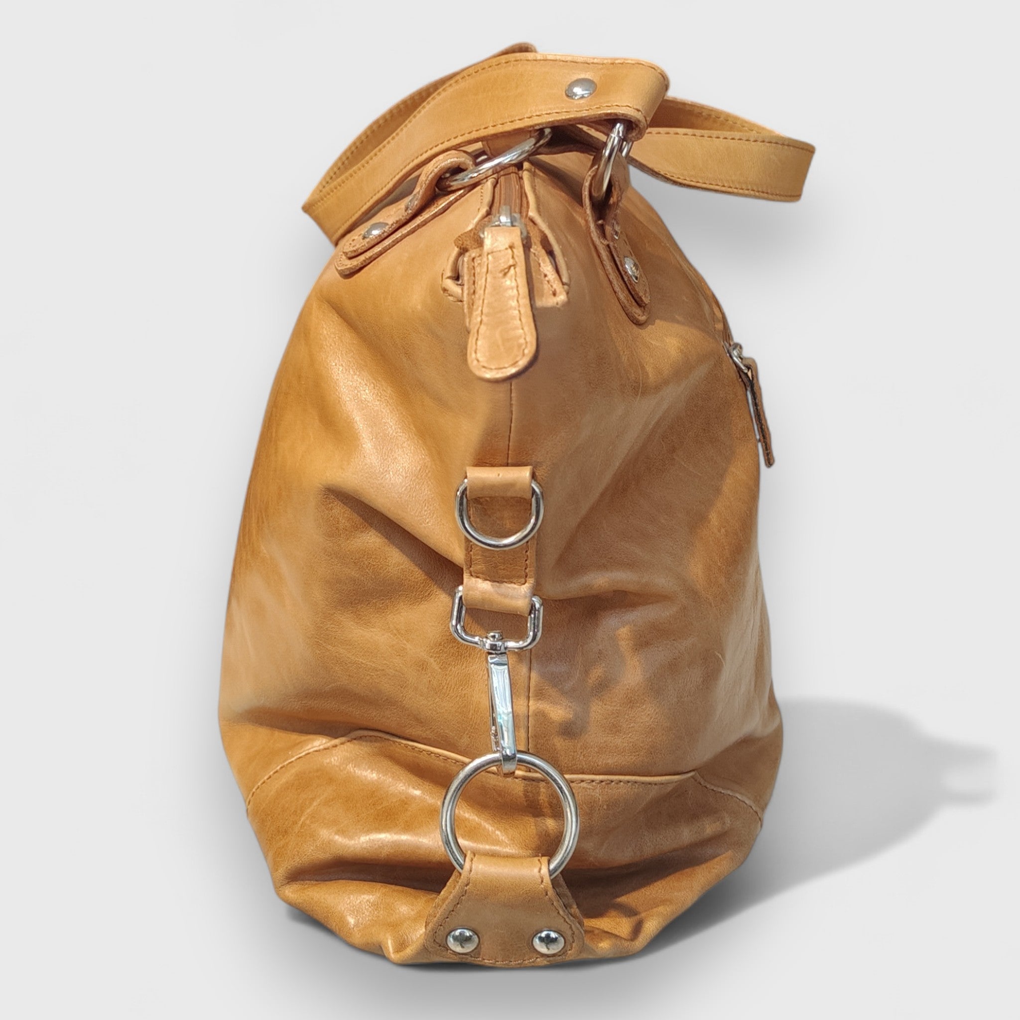 Pelletteria Pelle Nuda Milano, Artigianato Italiano, Vera pelle, Negozio Borse viaggio, Torino miele