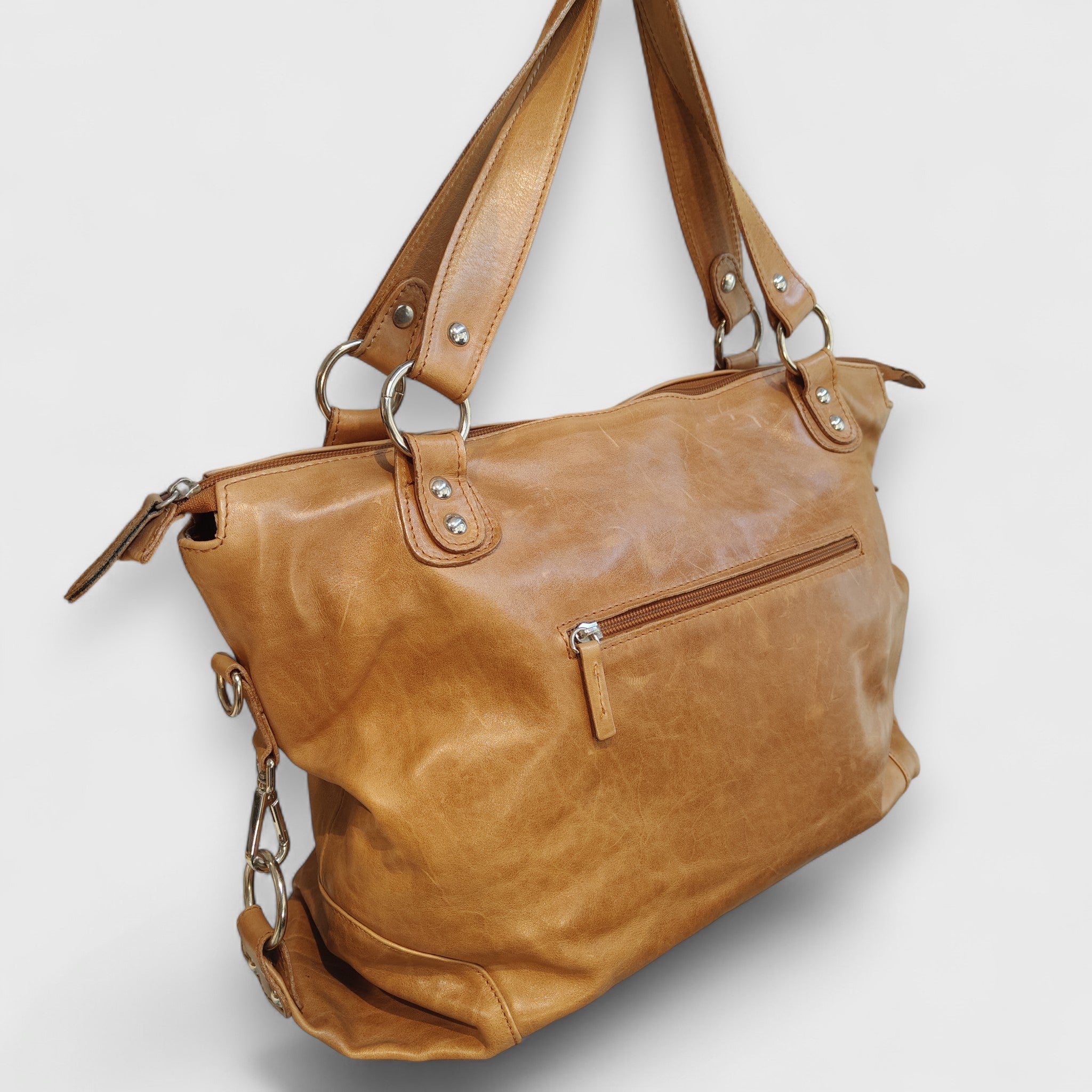 Pelletteria Pelle Nuda Milano, Artigianato Italiano, Vera pelle, Negozio Borse viaggio, Torino miele