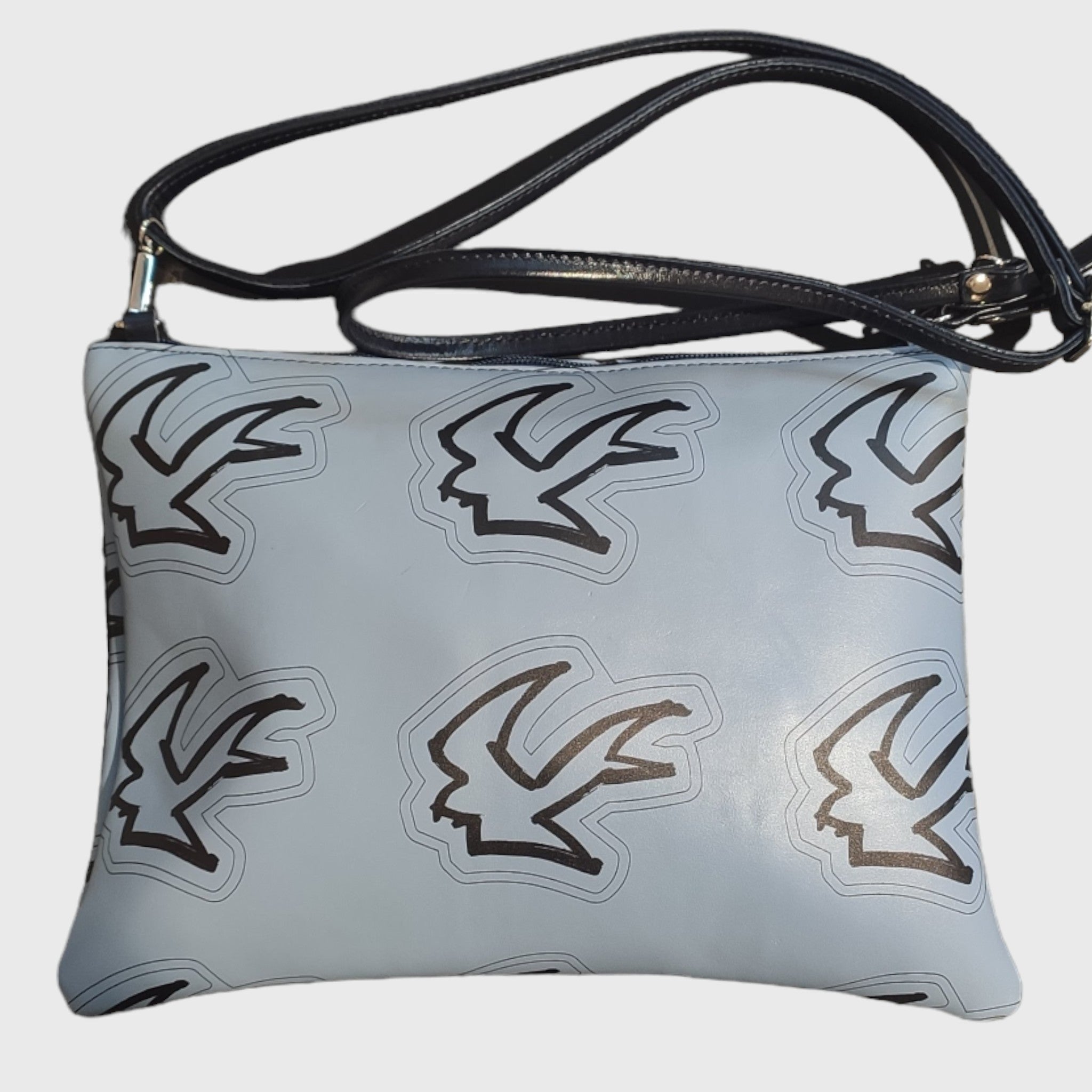 Pelletteria Pelle Nuda Milano, artigianato italiano, vera pelle, borsa donna, Trousse Clara celeste