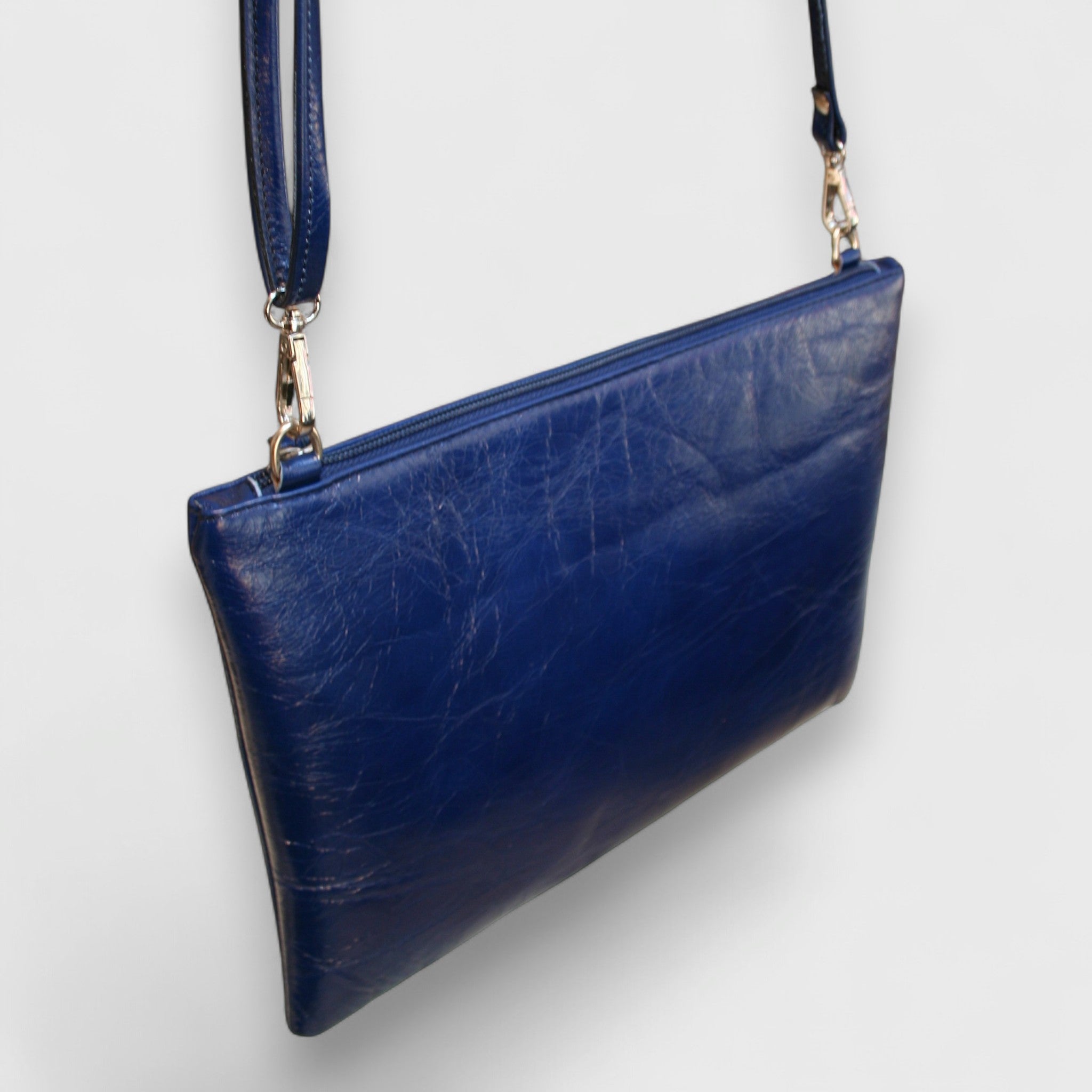 Pelletteria Pelle Nuda Milano, Artigianato Italiano, Vera pelle, Negozio borse donna, Trousse Clara blu