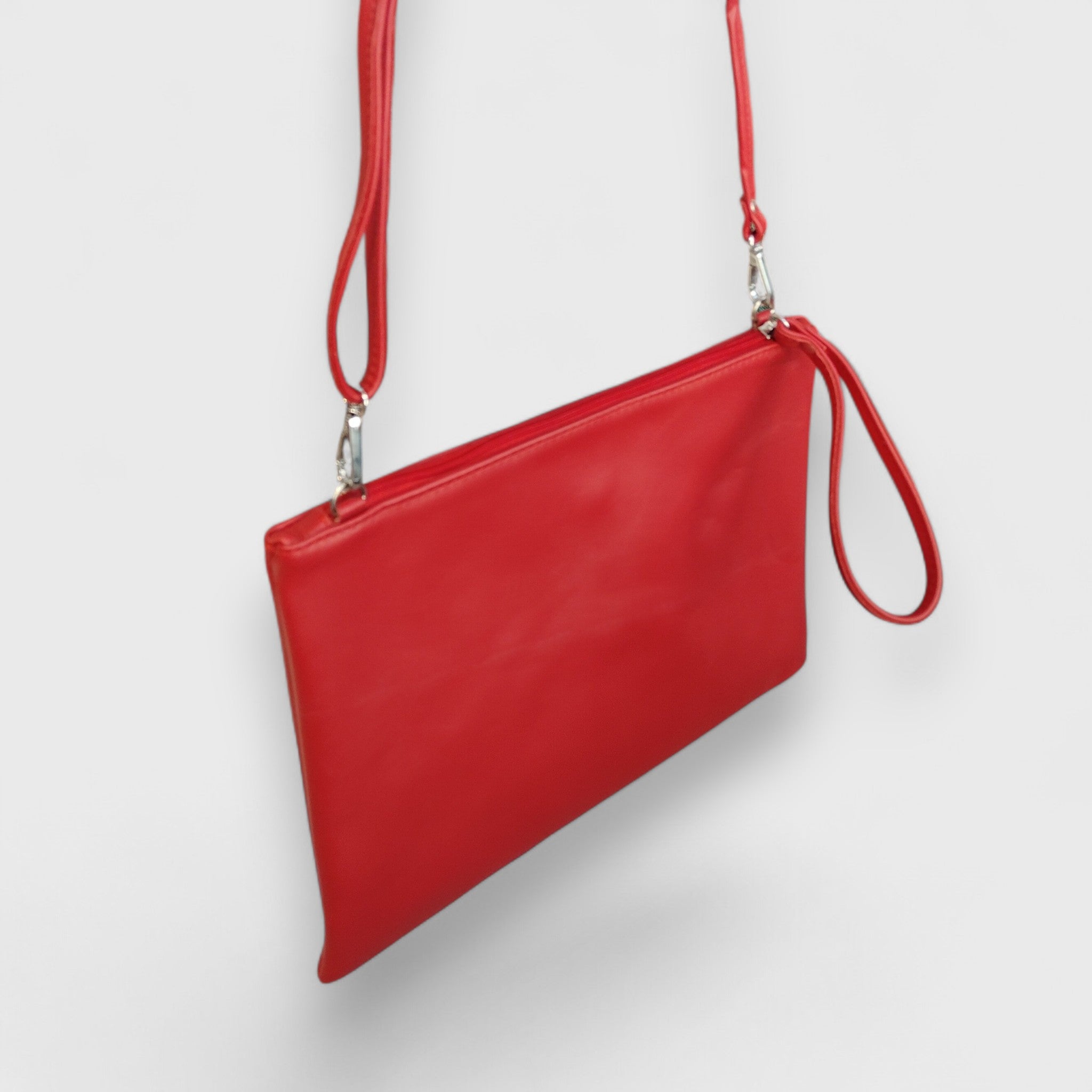 Pelletteria Pelle Nuda Milano, Vera pelle Italiana, Negozio borse donna, Trousse Clara rosso