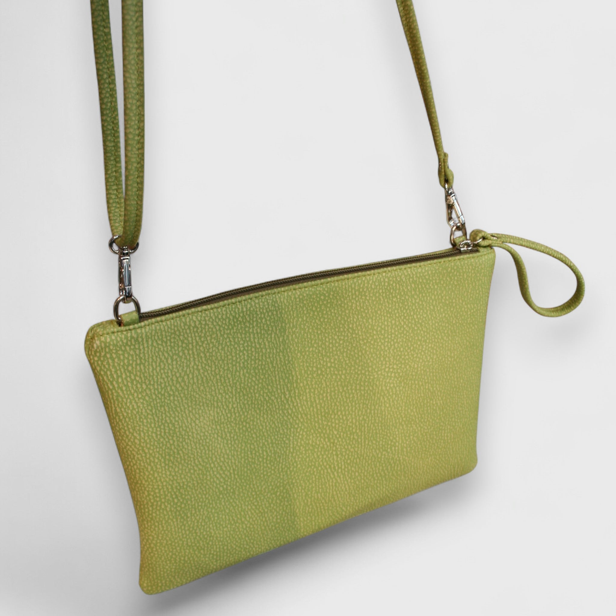 Pelletteria Pelle Nuda Milano, Artigianato Italiano, vera pelle, Negozio borse donna, Trousse Clara verde