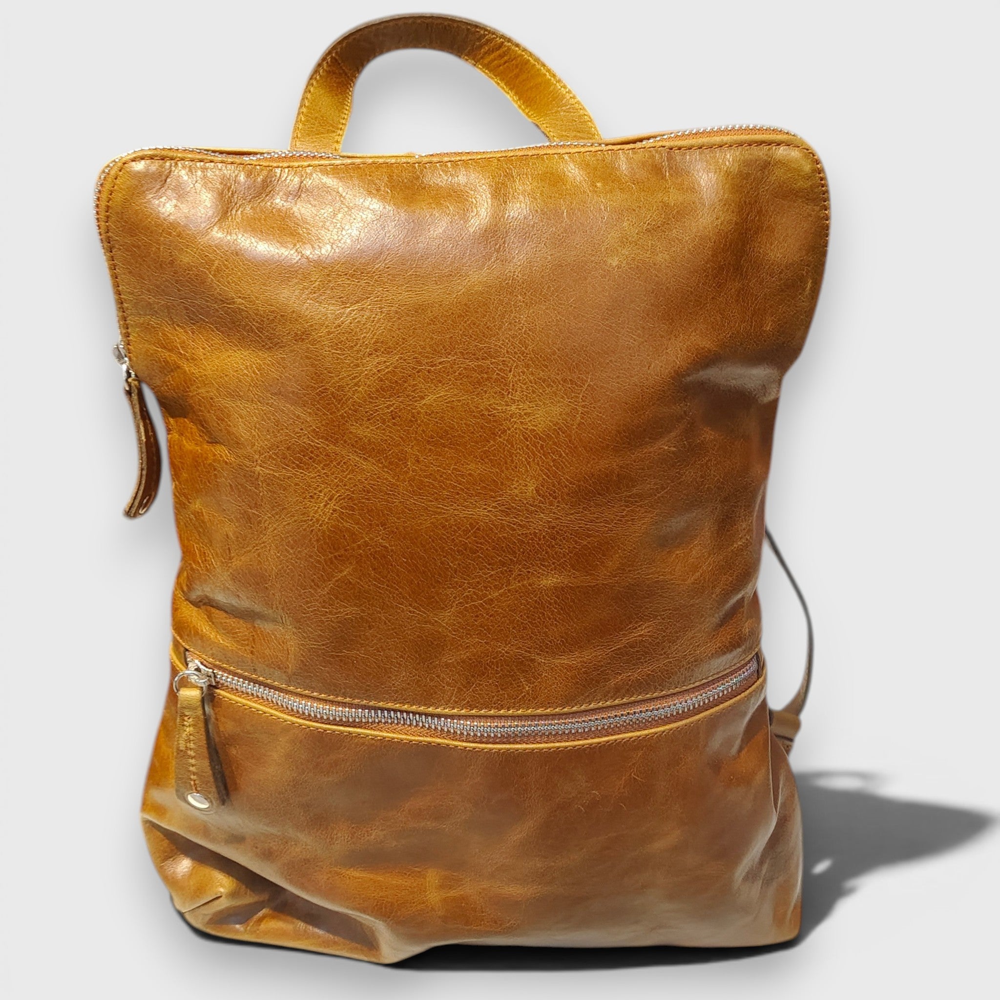 Pelletteria Pelle Nuda Milano, Vera pelle italiana, Negozio borse donna, Zaino Genova marrone