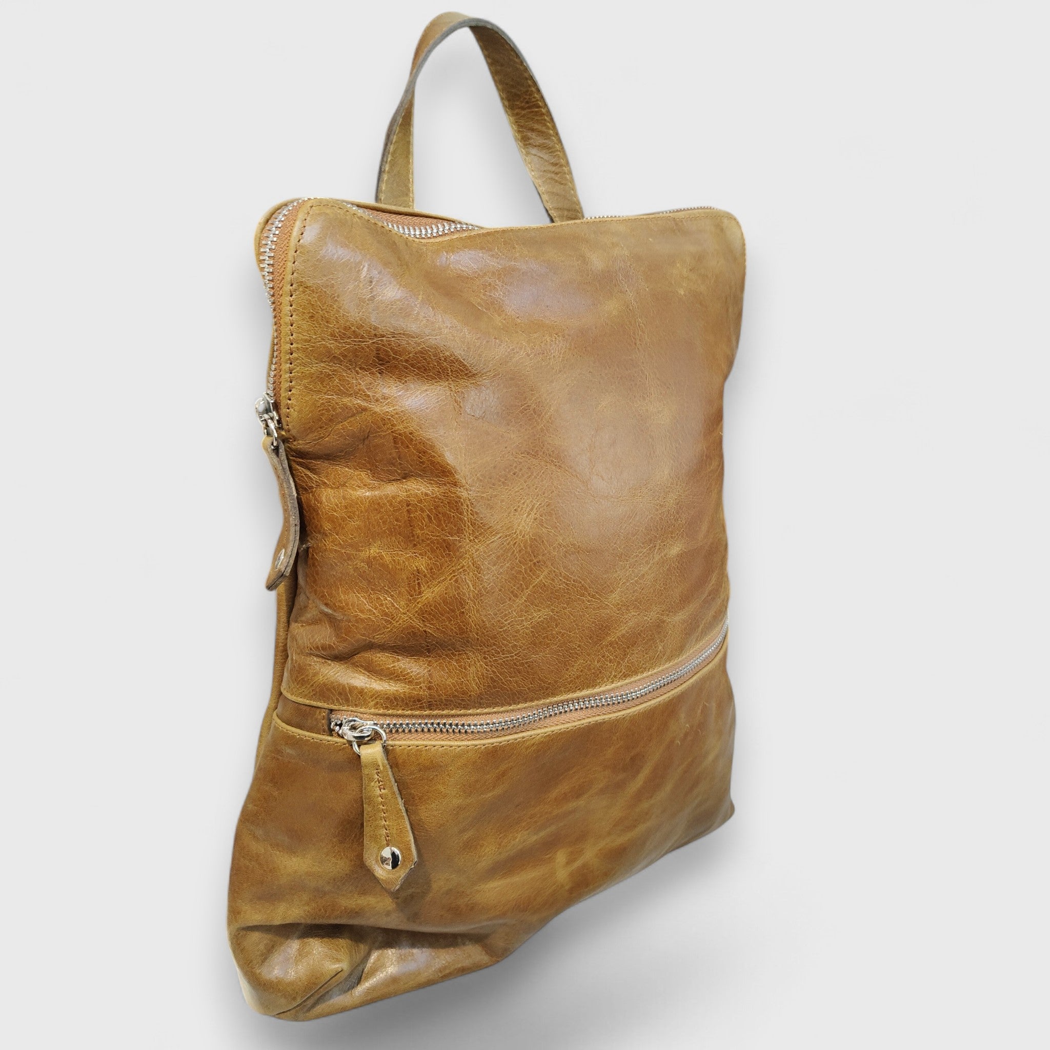 Pelletteria Pelle Nuda Milano, Vera pelle italiana, Negozio borse donna, Zaino Genova marrone