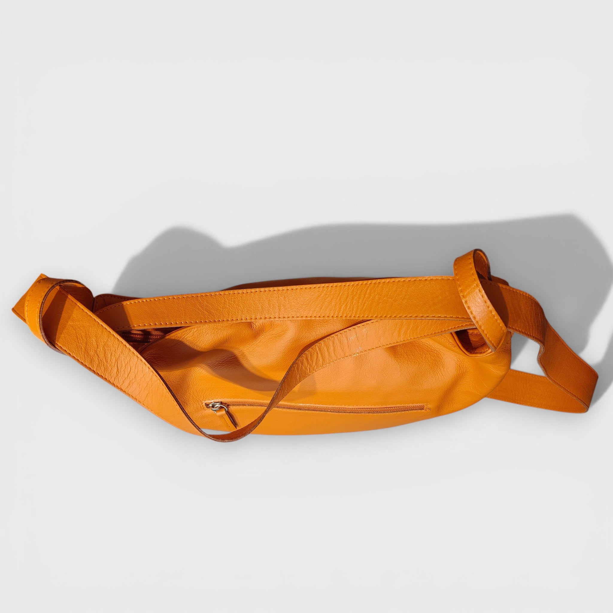 Pelletteria Pelle Nuda Milano, Artigianato Italiano, Vera pelle, Negozio borse donna, Zaino Roma arancione