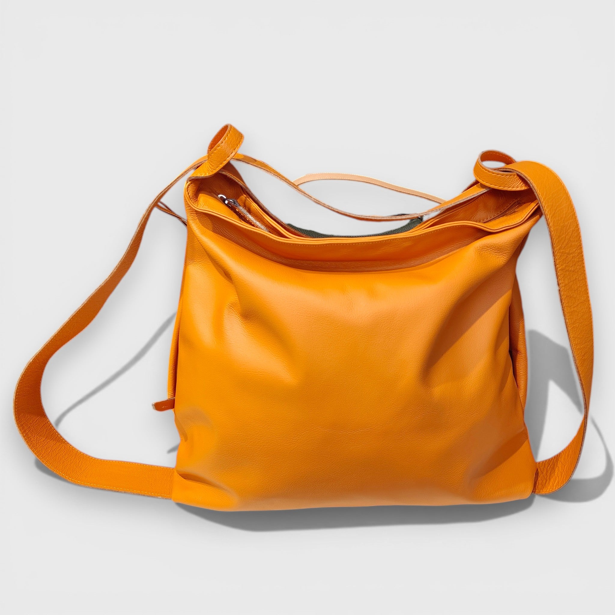 Pelletteria Pelle Nuda Milano, Artigianato Italiano, Vera pelle, Negozio borse donna, Zaino Roma arancione