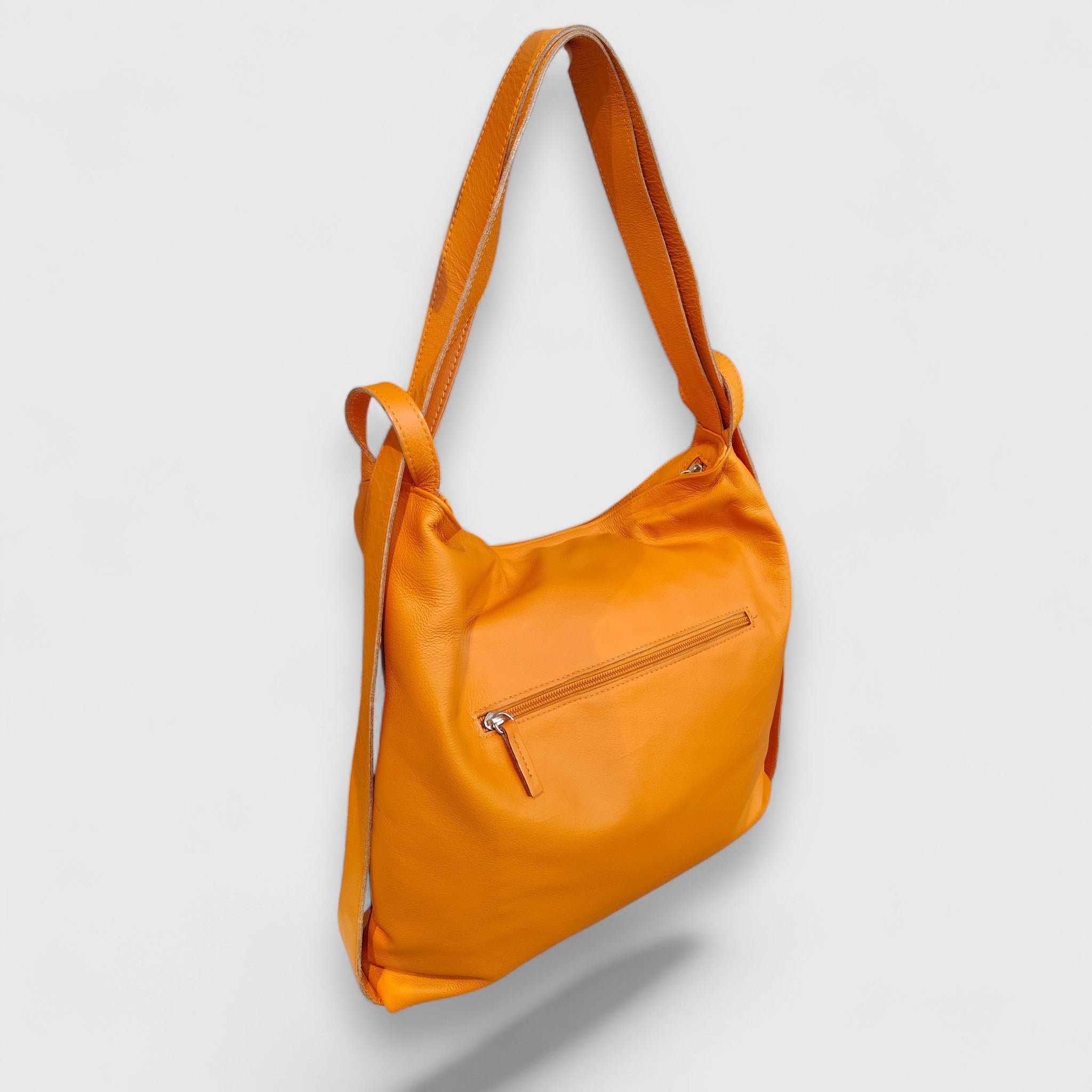 Pelletteria Pelle Nuda Milano, Artigianato Italiano, Vera pelle, Negozio borse donna, Zaino Roma arancione