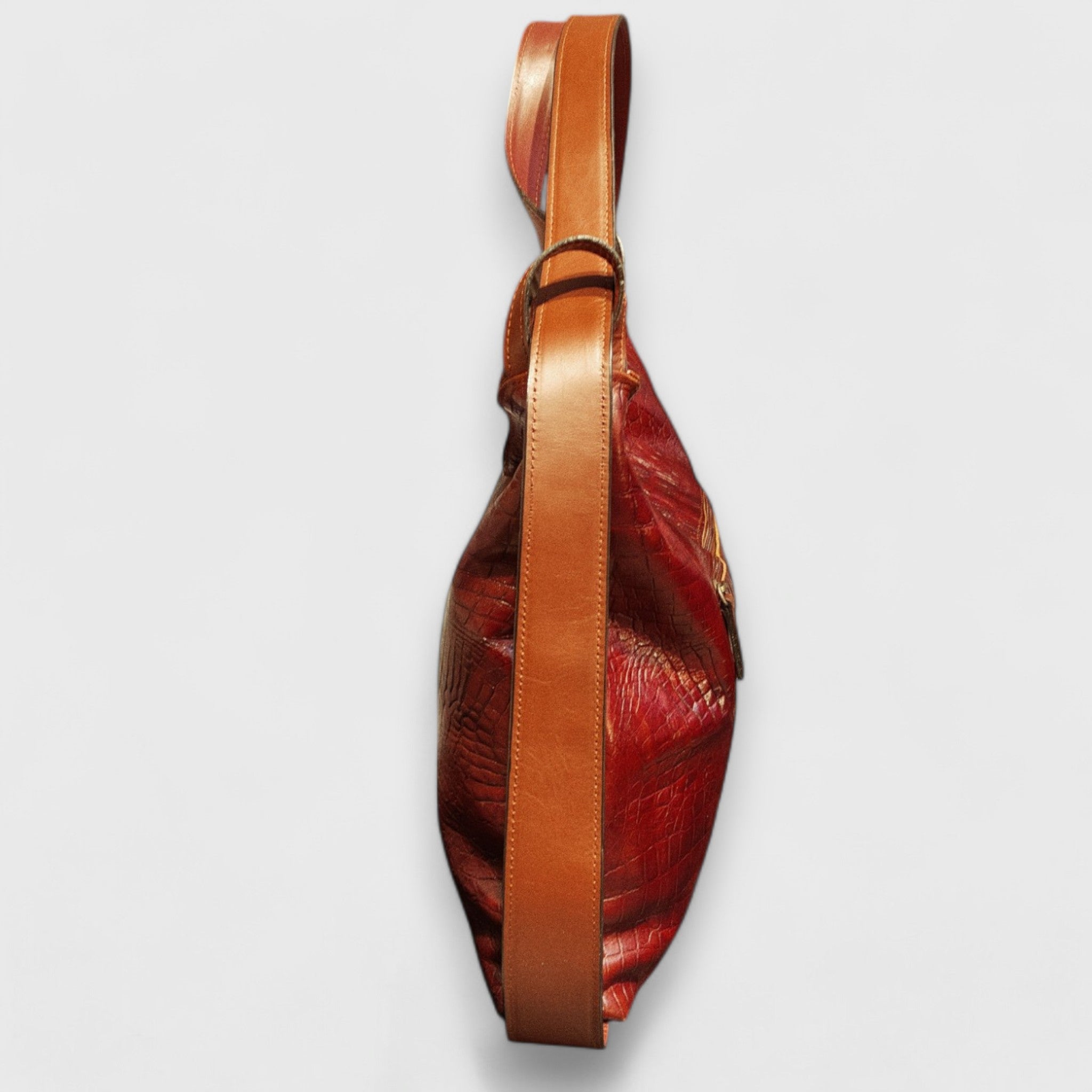 Pelletteria Pelle Nuda Milano, Artigianato italiano, vera pelle, negozio borse donna, Zaino rosso stampa coccodrillo