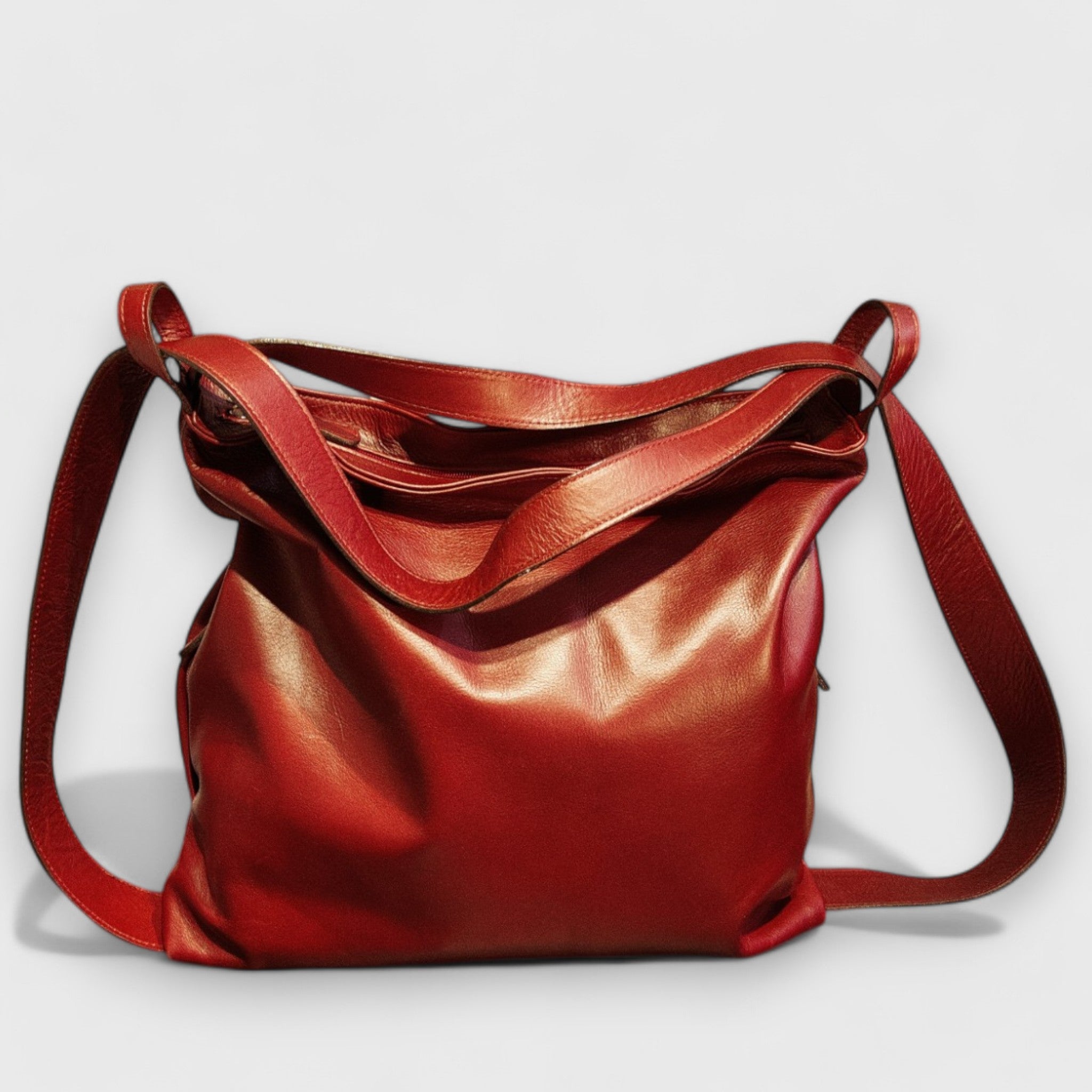 Pelletteria Pelle Nuda Milano, Artigianato italiano, vera pelle, negozio borse donna, Zaino Roma rosso