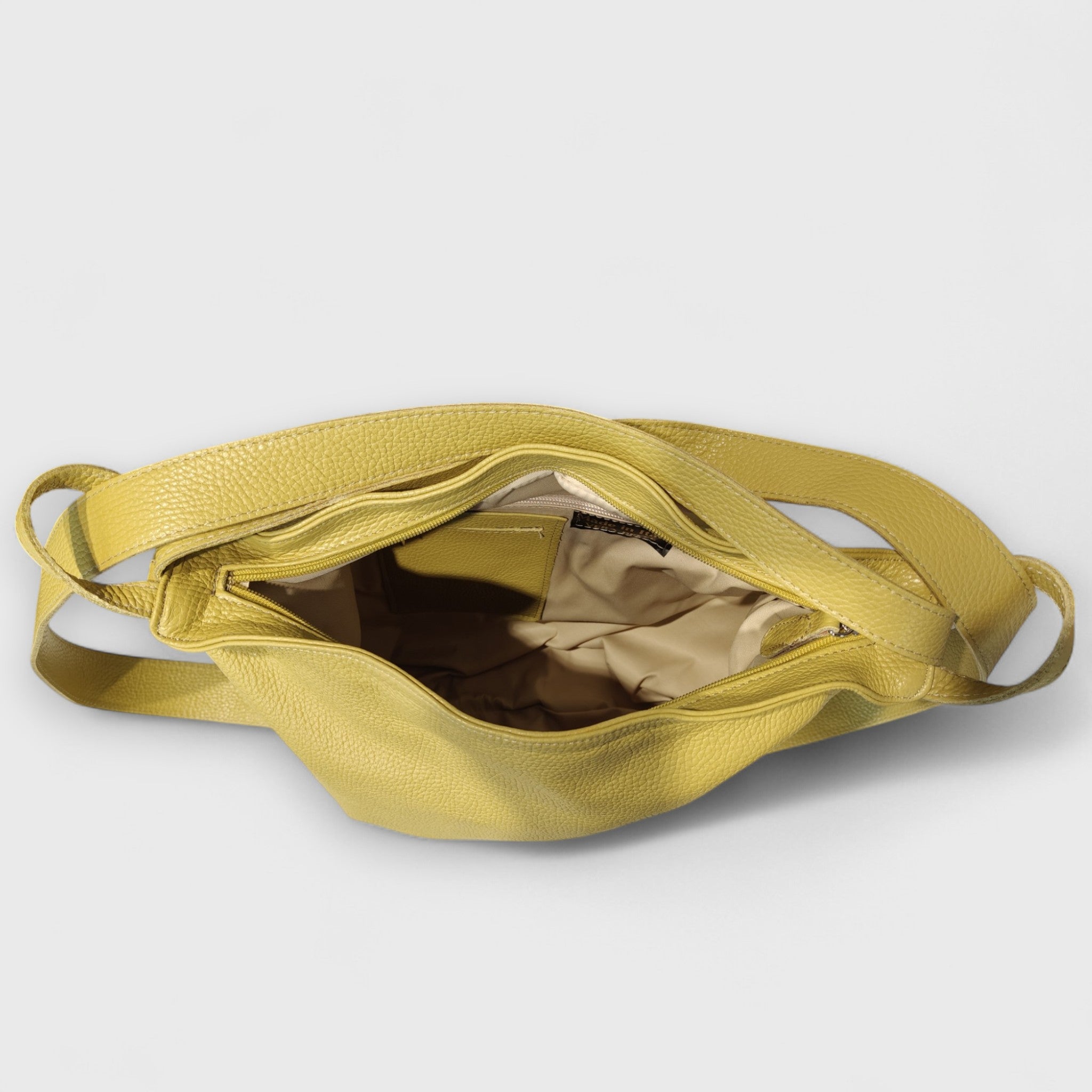 Pelletteria Pelle Nuda Milano, Artigianato Italiano, Vera Pelle, Negozio borse donna, Zaino Roma verde