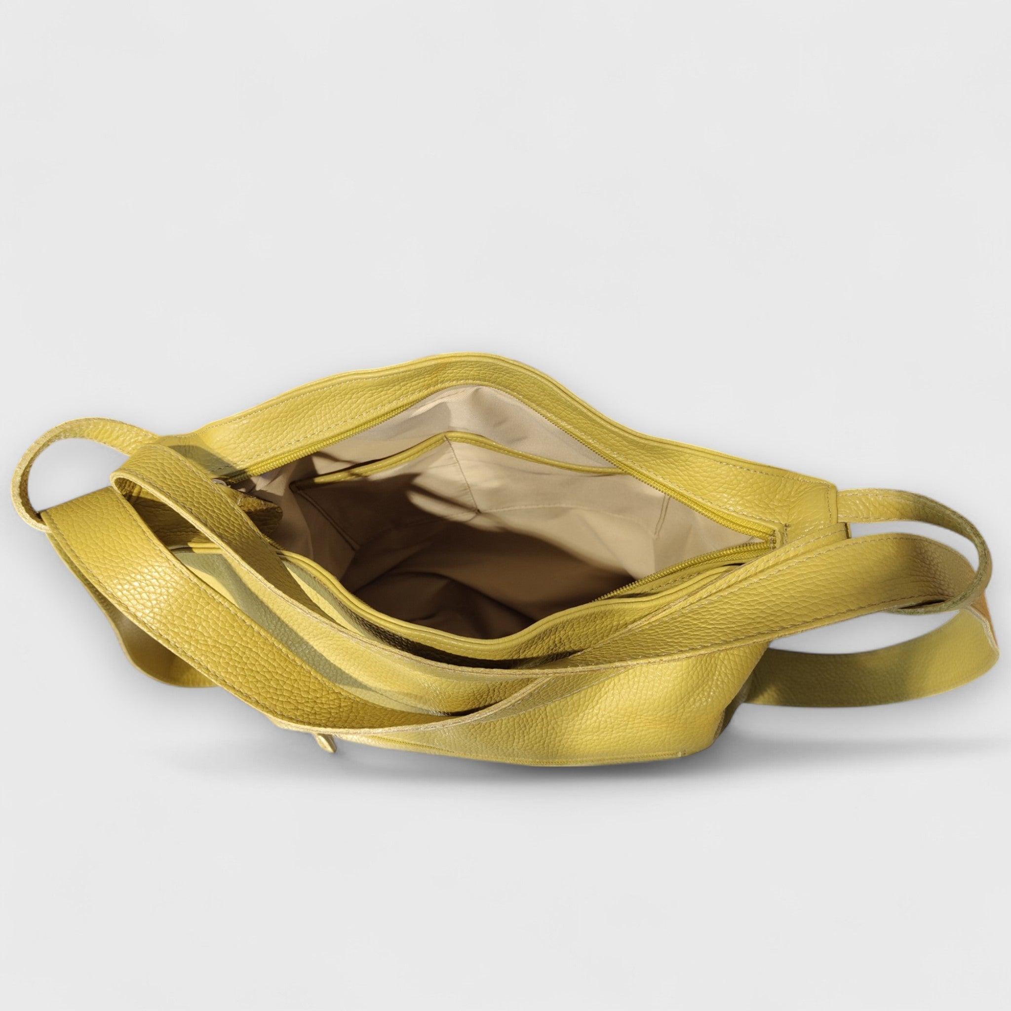 Pelletteria Pelle Nuda Milano, Artigianato Italiano, Vera Pelle, Negozio borse donna, Zaino Roma verde