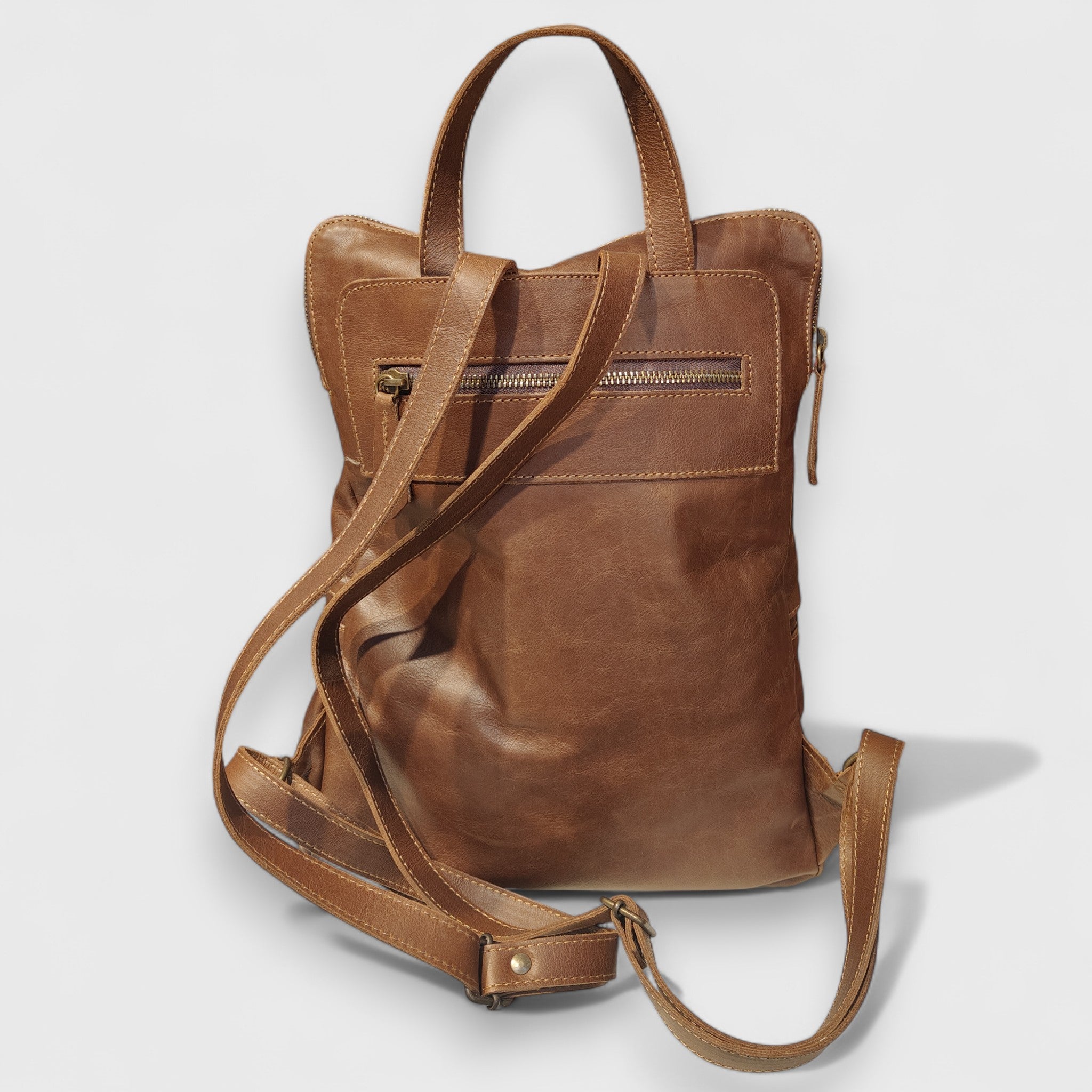 Pelletteria Pelle Nuda Milano, Artigianato Italiano, Vera pelle, Negozio borse donna uomo, Zaino Genova marrone