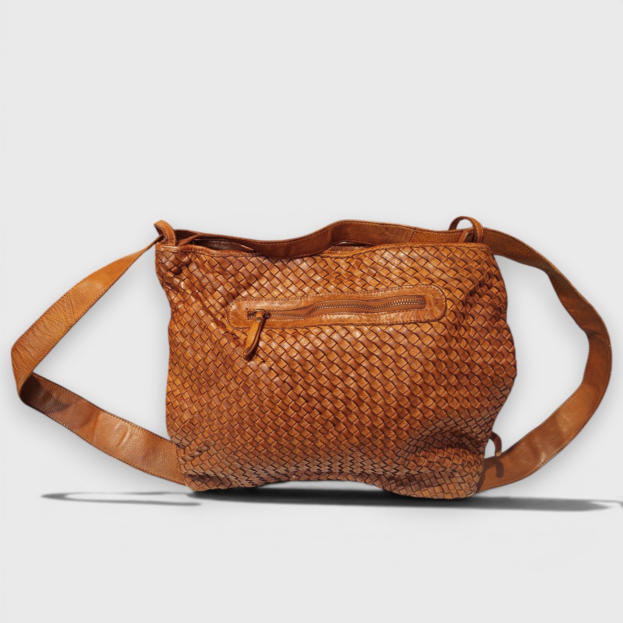 Pelletteria Pelle Nuda Milano, Vera pelle italiana, Borse donna, Zaino roma intrecciato marone