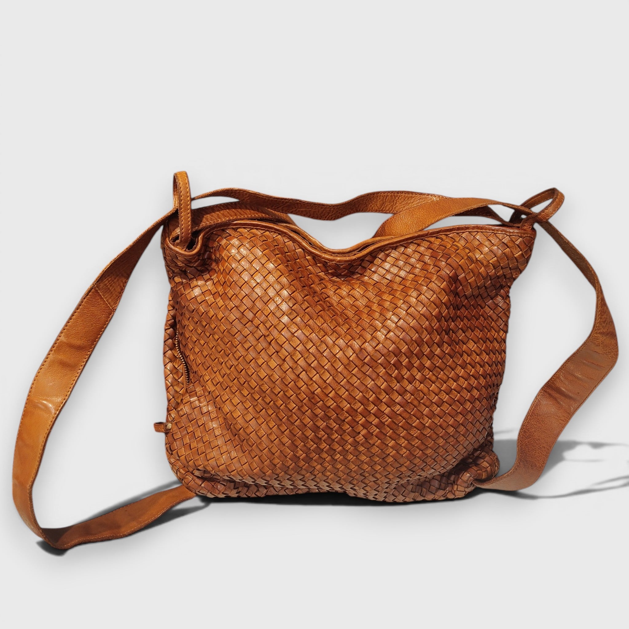Pelletteria Pelle Nuda Milano, Vera pelle italiana, Borse donna, Zaino roma intrecciato marone