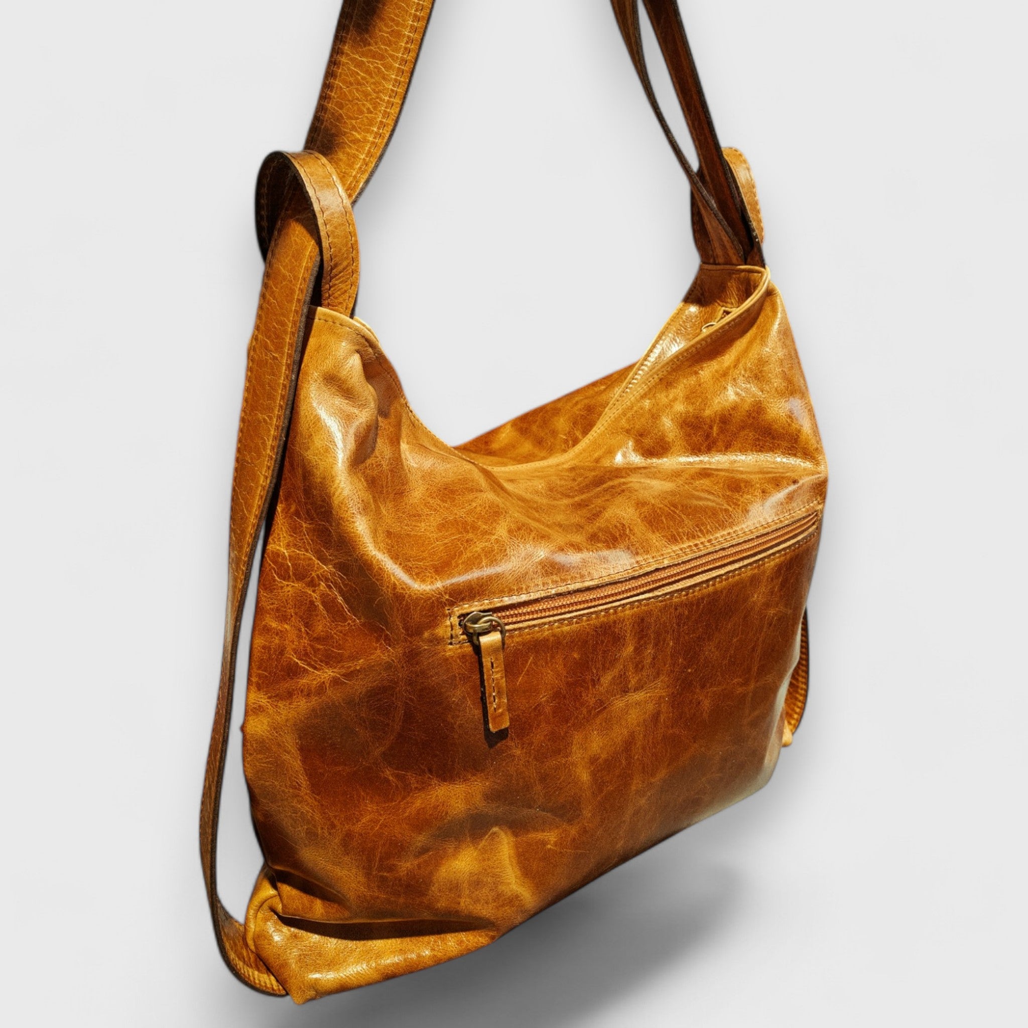 Pelletteria Pelle Nuda Milano, Artigianato italiano, vera pelle, borsa donna, zaino Roma miele