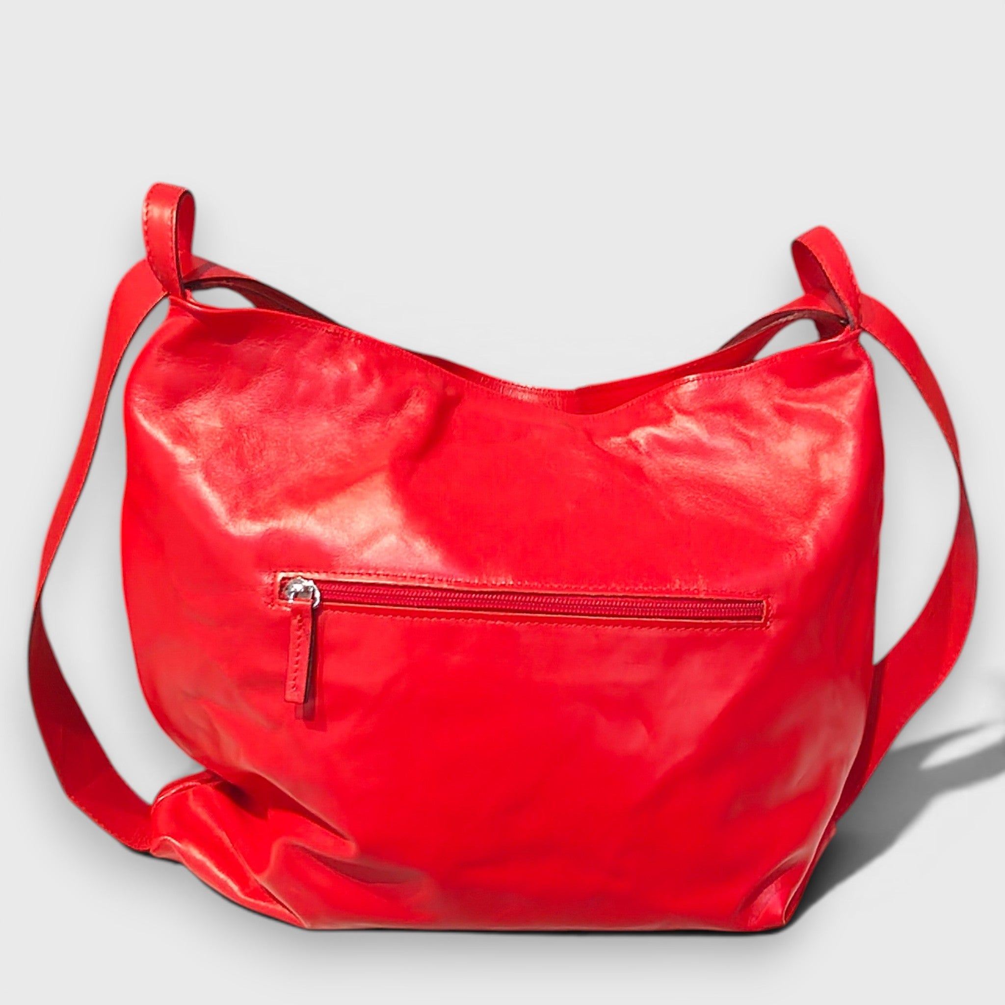Pelletteria Pelle Nuda Milano, Vera pelle italiana, Negozio borse donna, Zaino Roma rosso