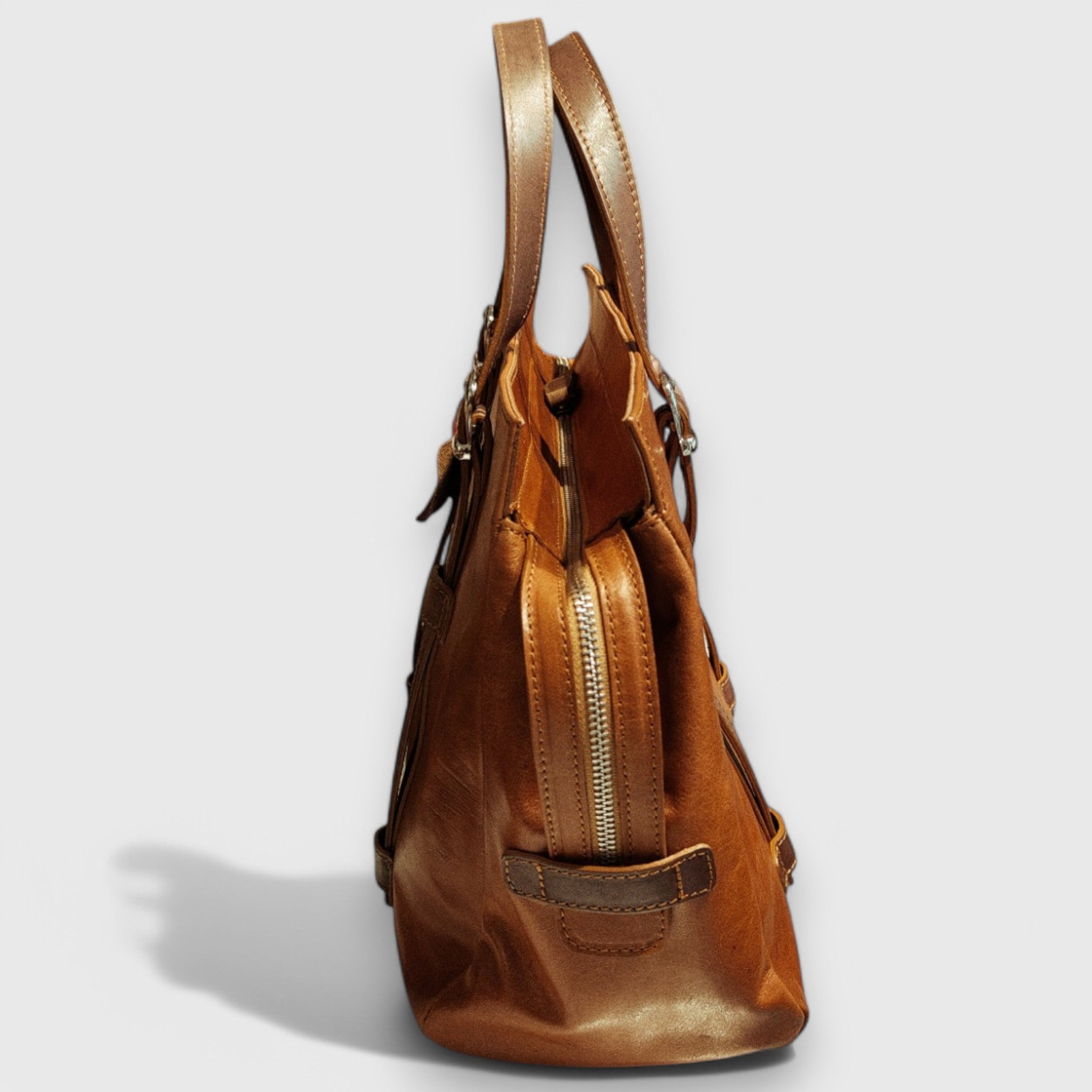 Pelletteria Pelle Nuda Milano, Artigianato Italiano, Vera pelle, Negozio borse donna, Inglesina marrone