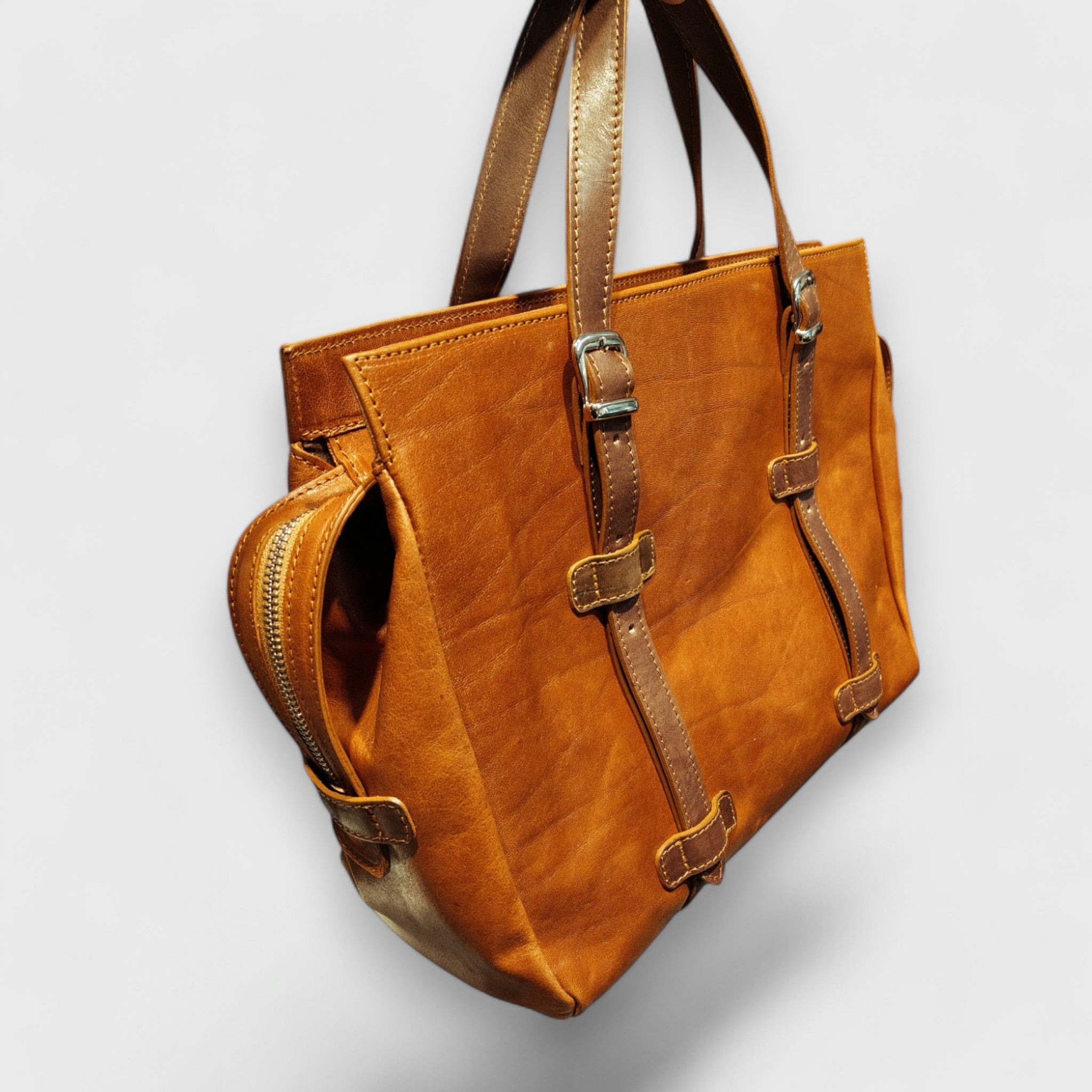 Pelletteria Pelle Nuda Milano, Artigianato Italiano, Vera pelle, Negozio borse donna, Inglesina marrone