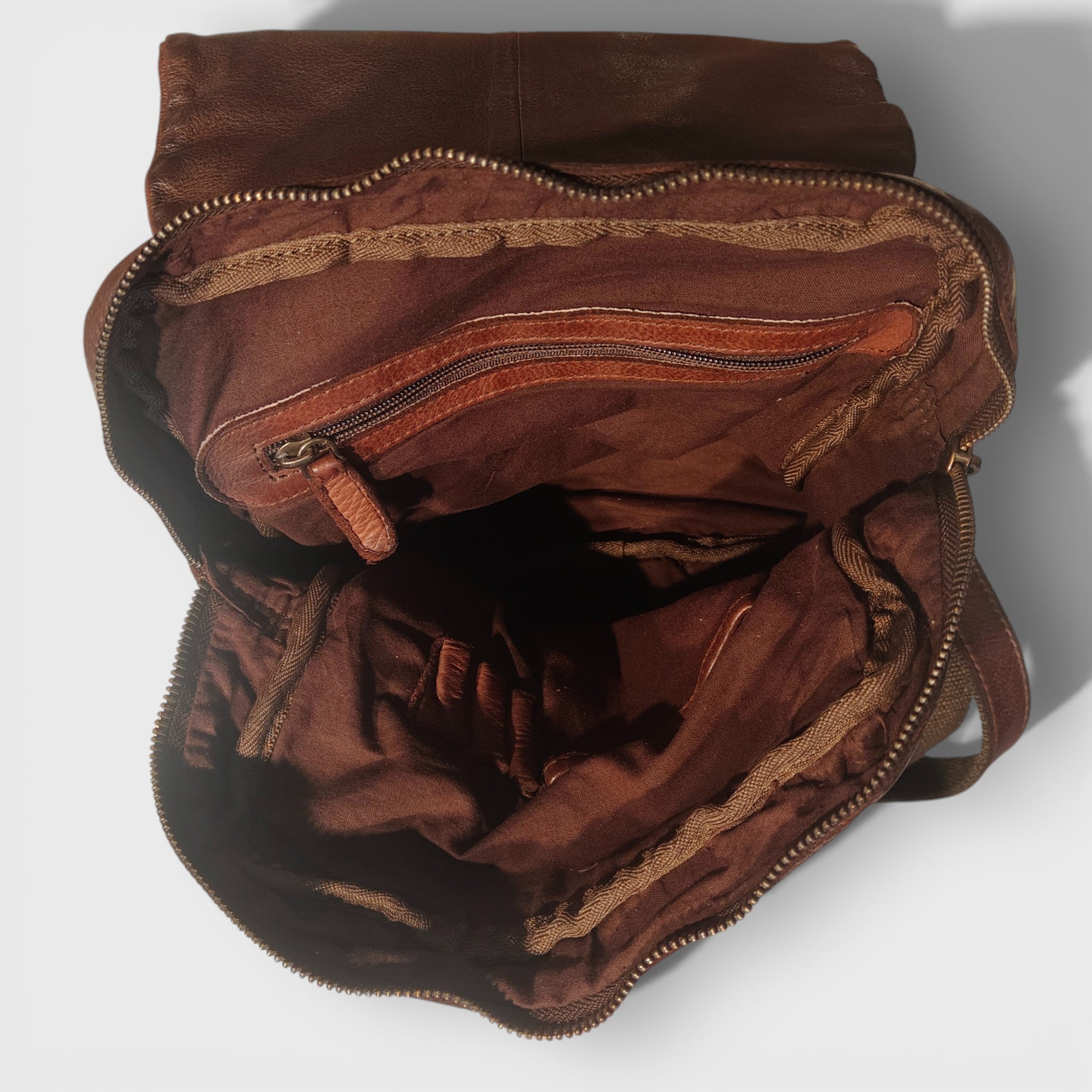 Pelletteria Pelle Nuda Milano, Artigianato Italiano, Vera pelle, Negozio borse donna, Mini zaino marrone