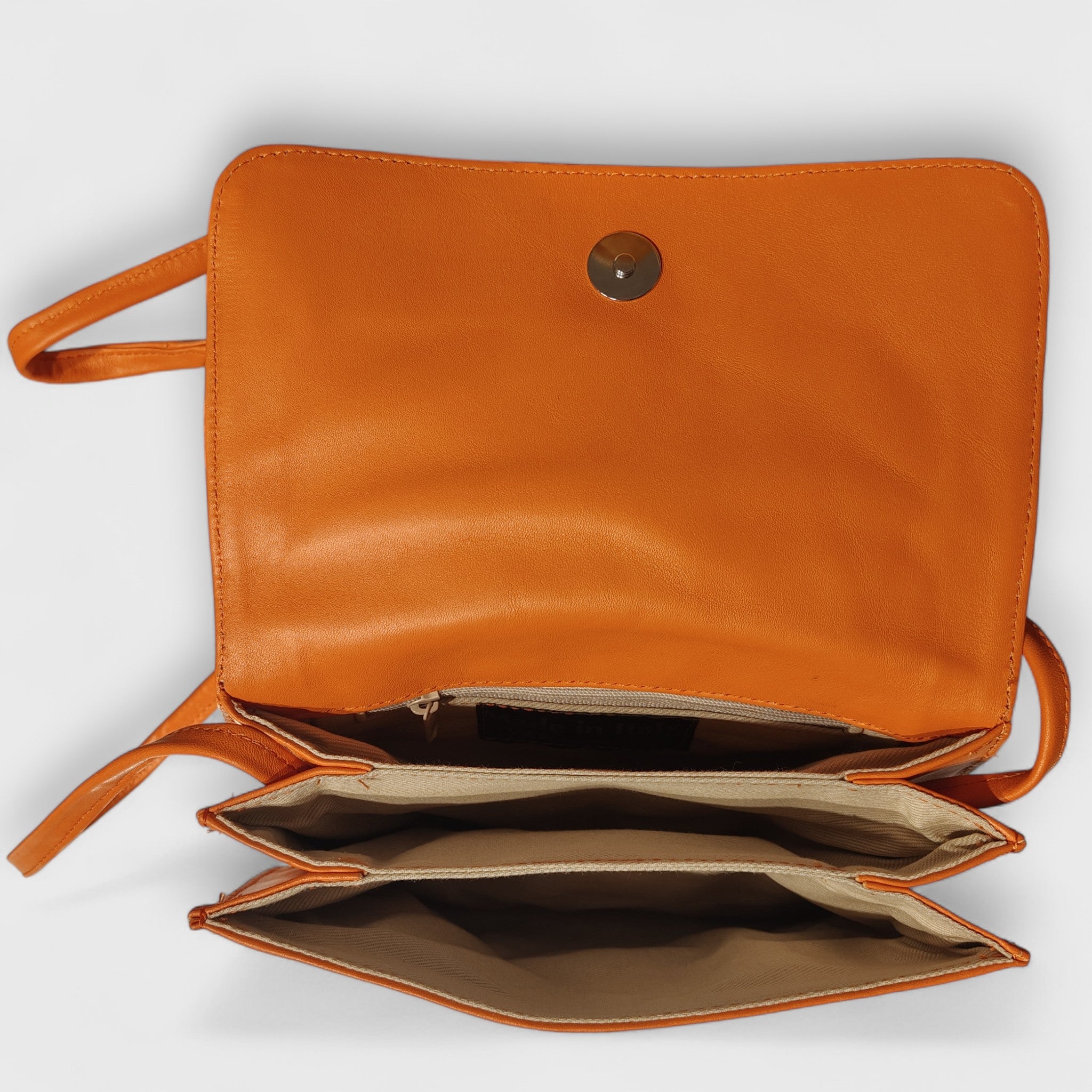 Pelletteria Pelle Nuda Milano, Artigianato Italiano, Vera pelle, Negozio borse donna, tre soffietti arancione
