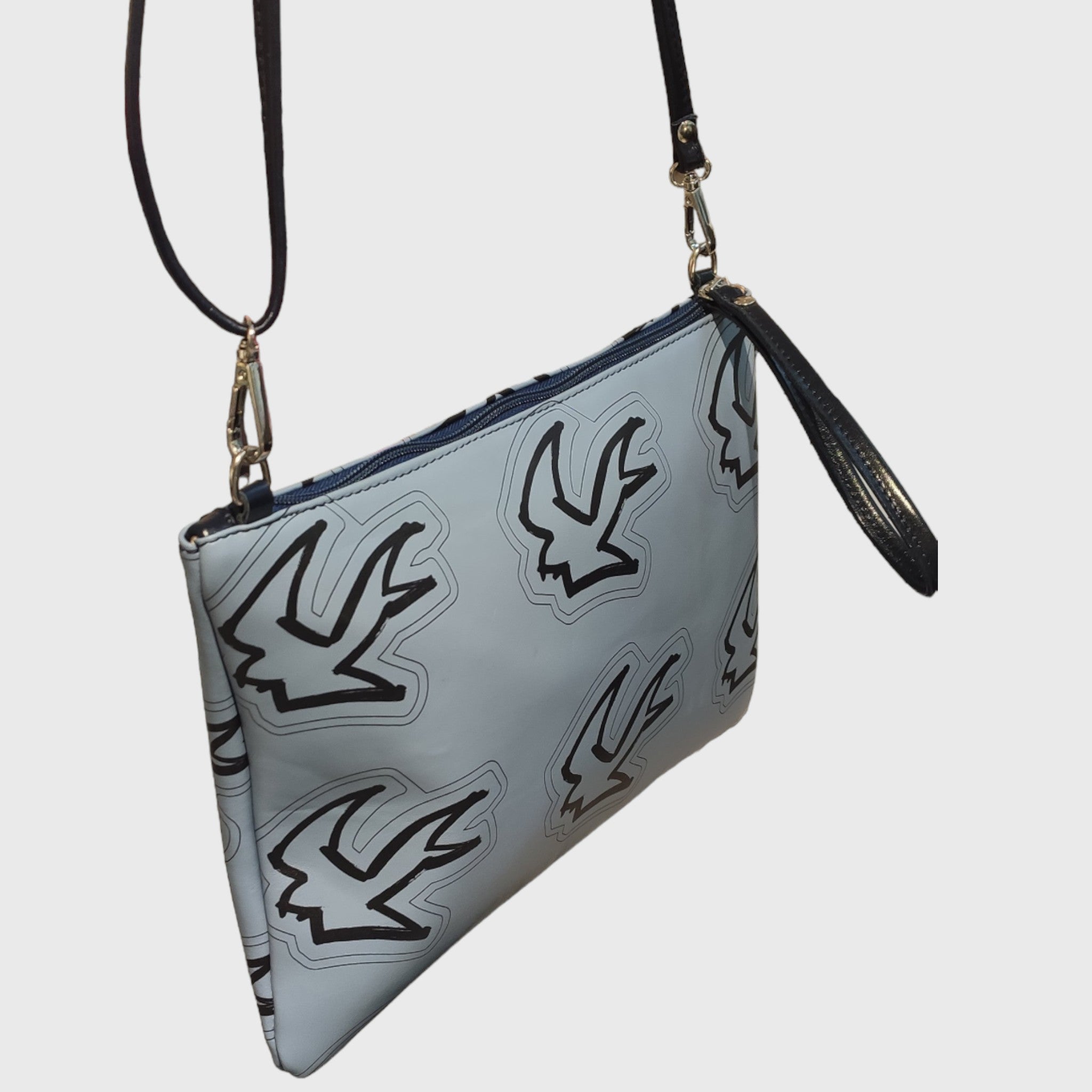 Pelletteria Pelle Nuda Milano, artigianato italiano, vera pelle, borsa donna, Trousse Clara celeste