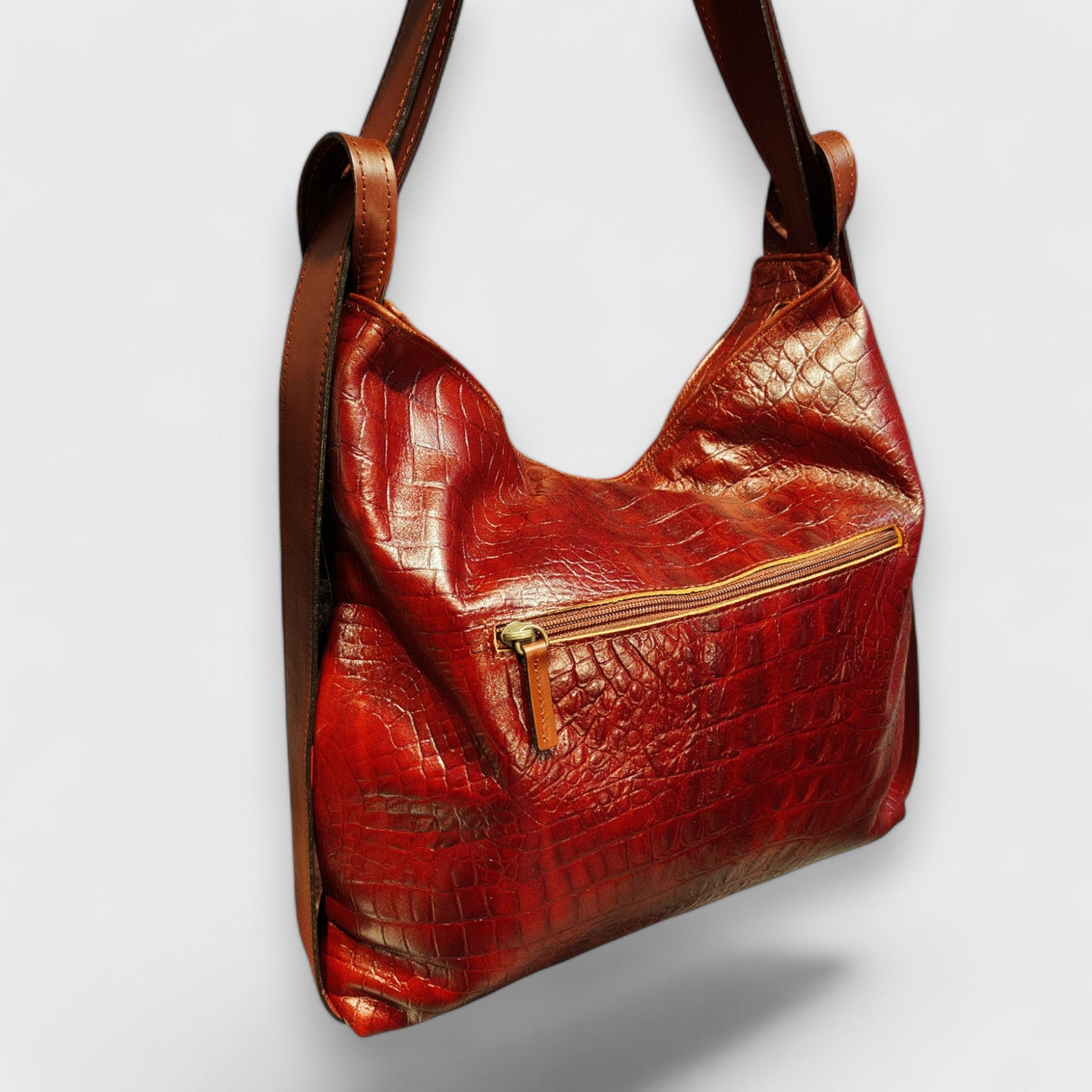 Pelletteria Pelle Nuda Milano, Artigianato italiano, vera pelle, negozio borse donna, Zaino rosso stampa coccodrillo