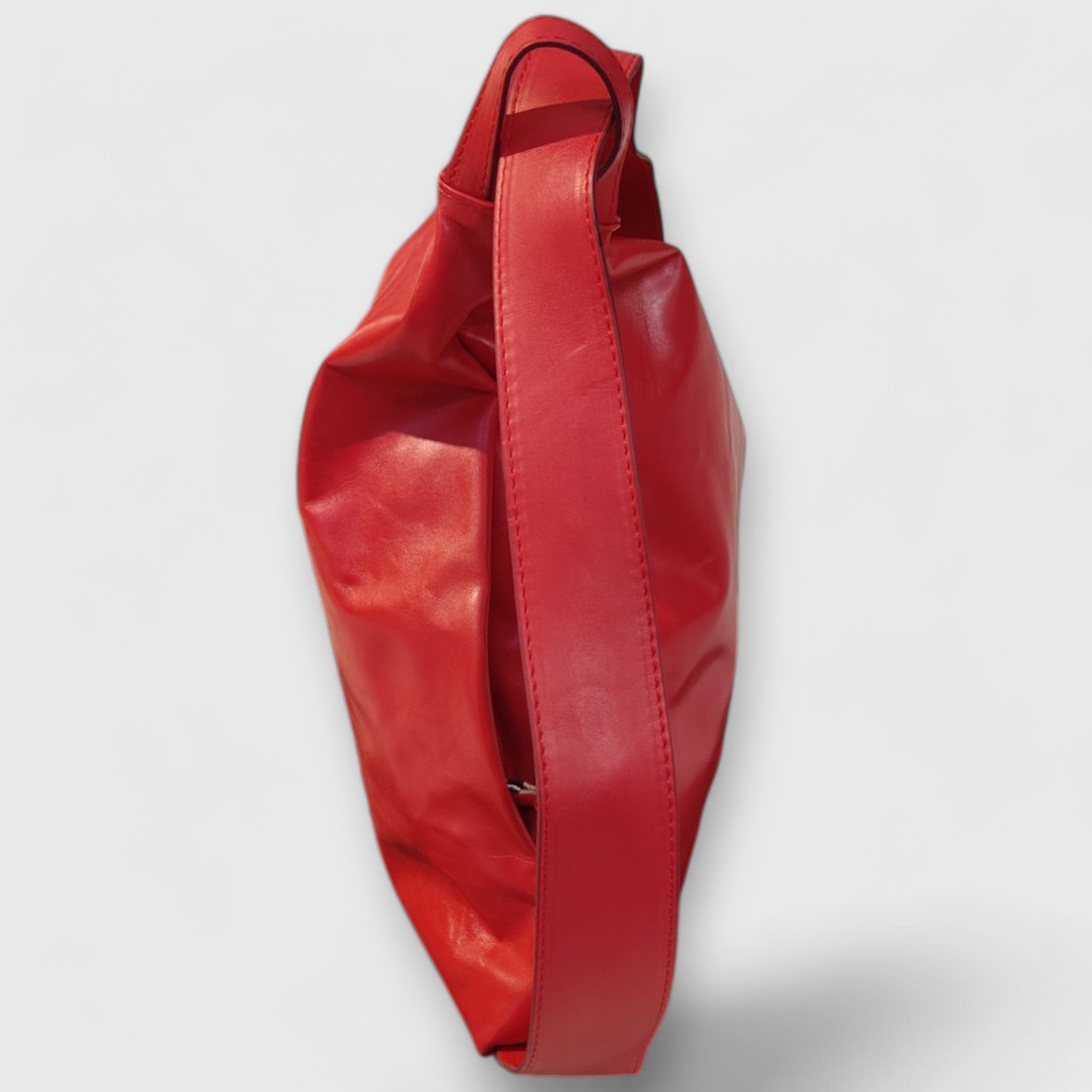 Pelletteria Pelle Nuda Milano, Artigianato Italiano, vera pelle, borsa donna, zaino Roma rosso