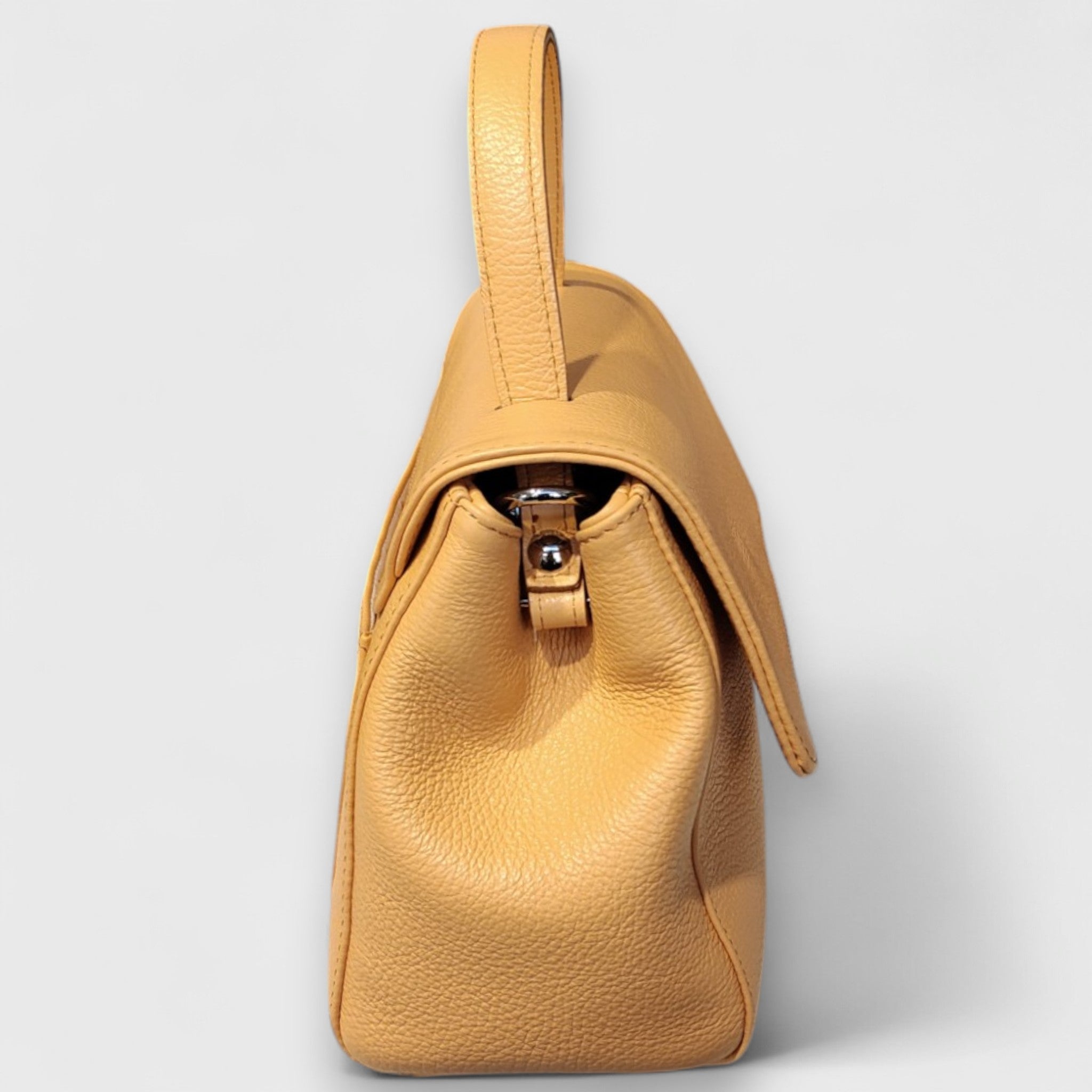 Pelletteria Pelle Nuda Milano, Artigianato Italiano, vera pelle, Negozio Borse donna, Amor arancione