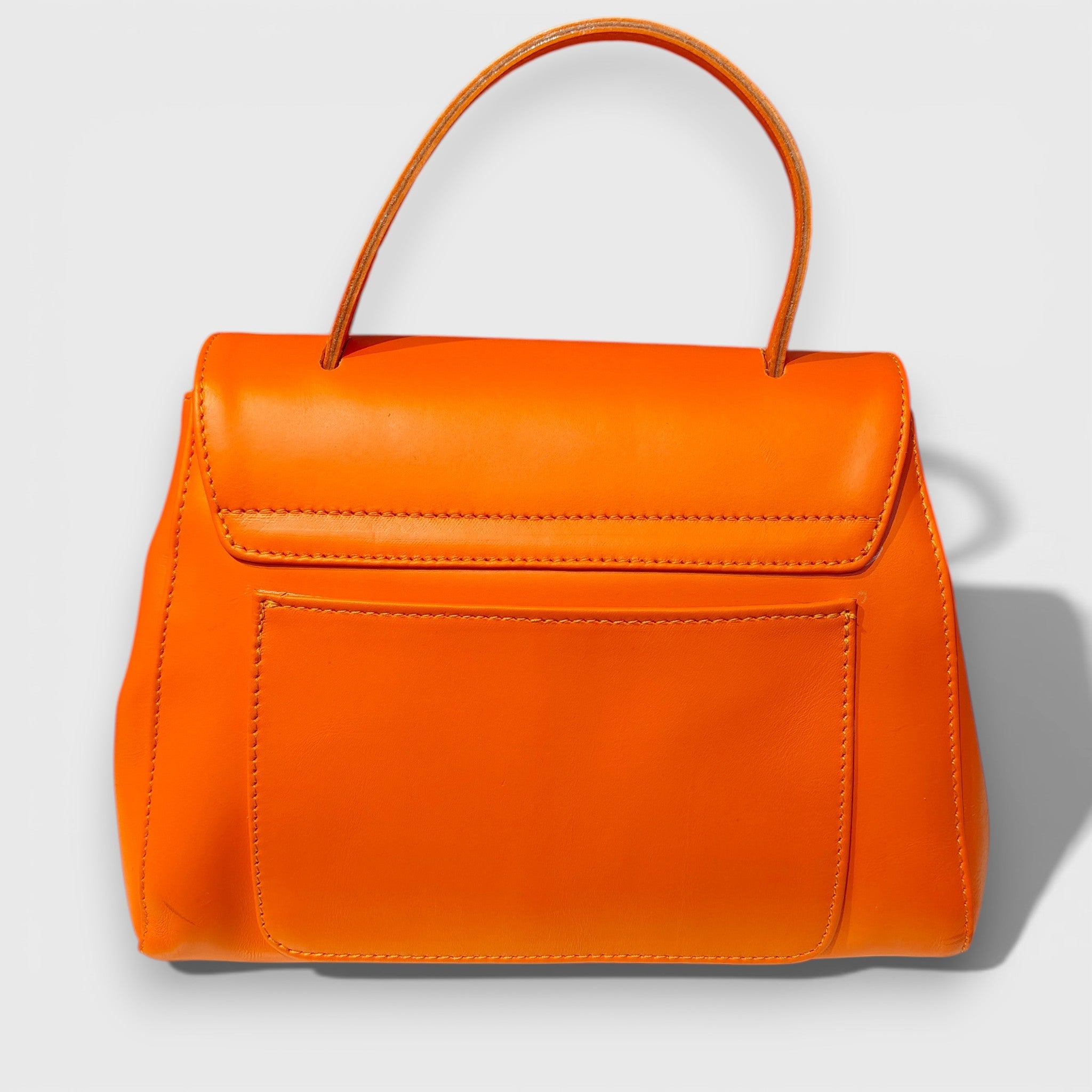 Pelletteria Pelle Nuda Milano, Artigianato Italiano, Vera pelle, Negozio borse donna, Amor arancione