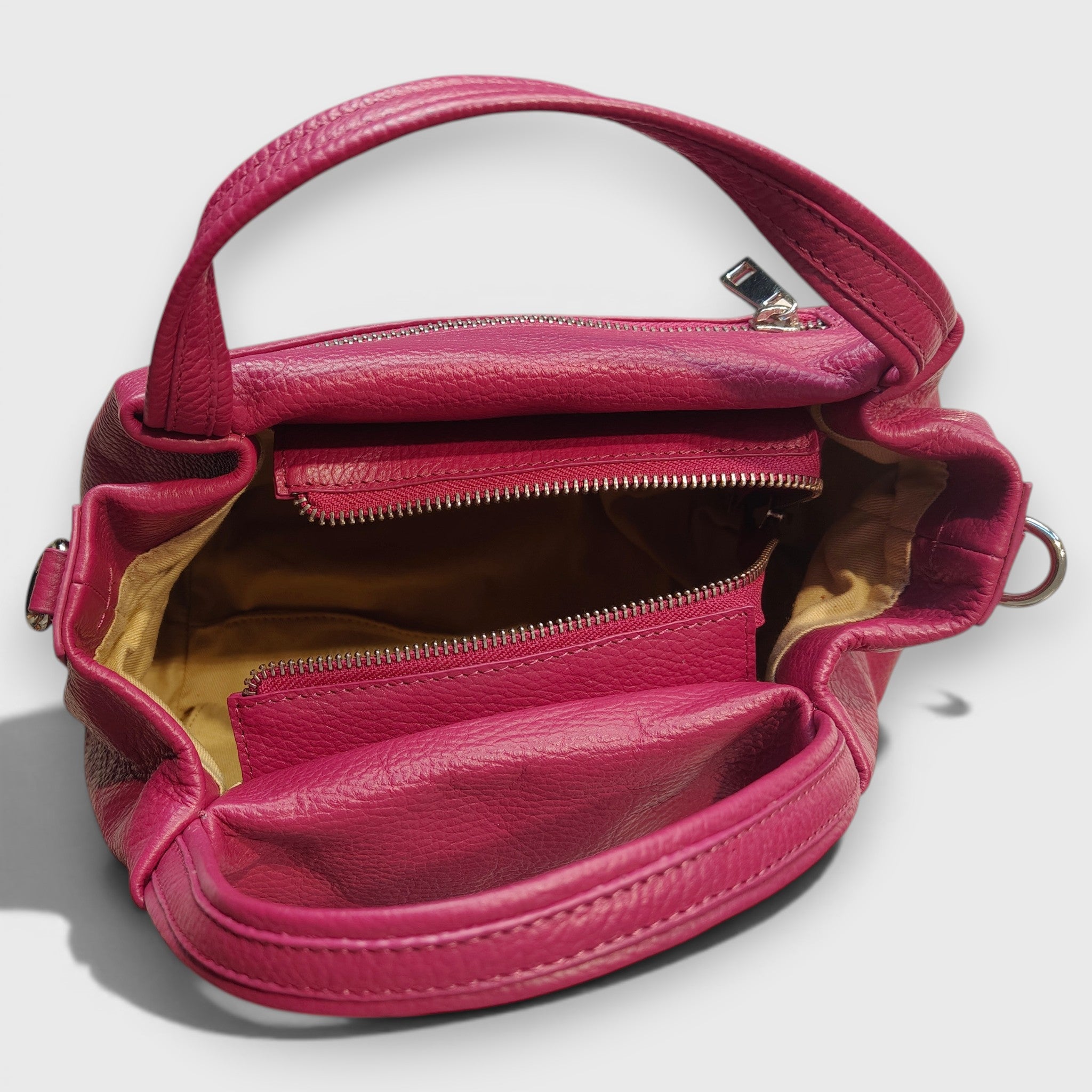 Pelletteria Pelle Nuda Milano, Vera pelle italiana, Negozio borse donna, Andrea fucsia