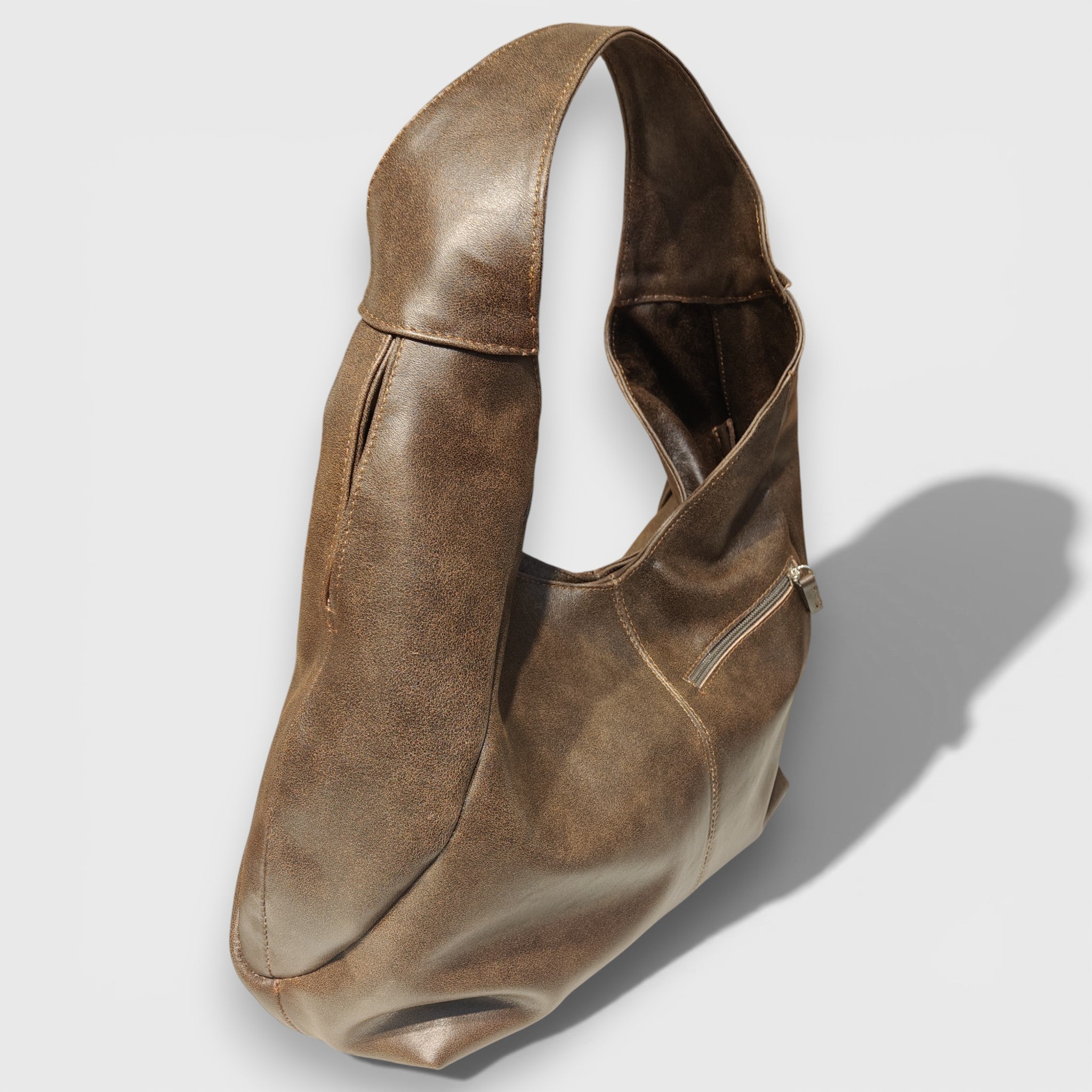 Pelletteria Pelle Nuda Milano, Artigianato Italiano, Vera pelle, Negozio borse donna, Barchetta marrone