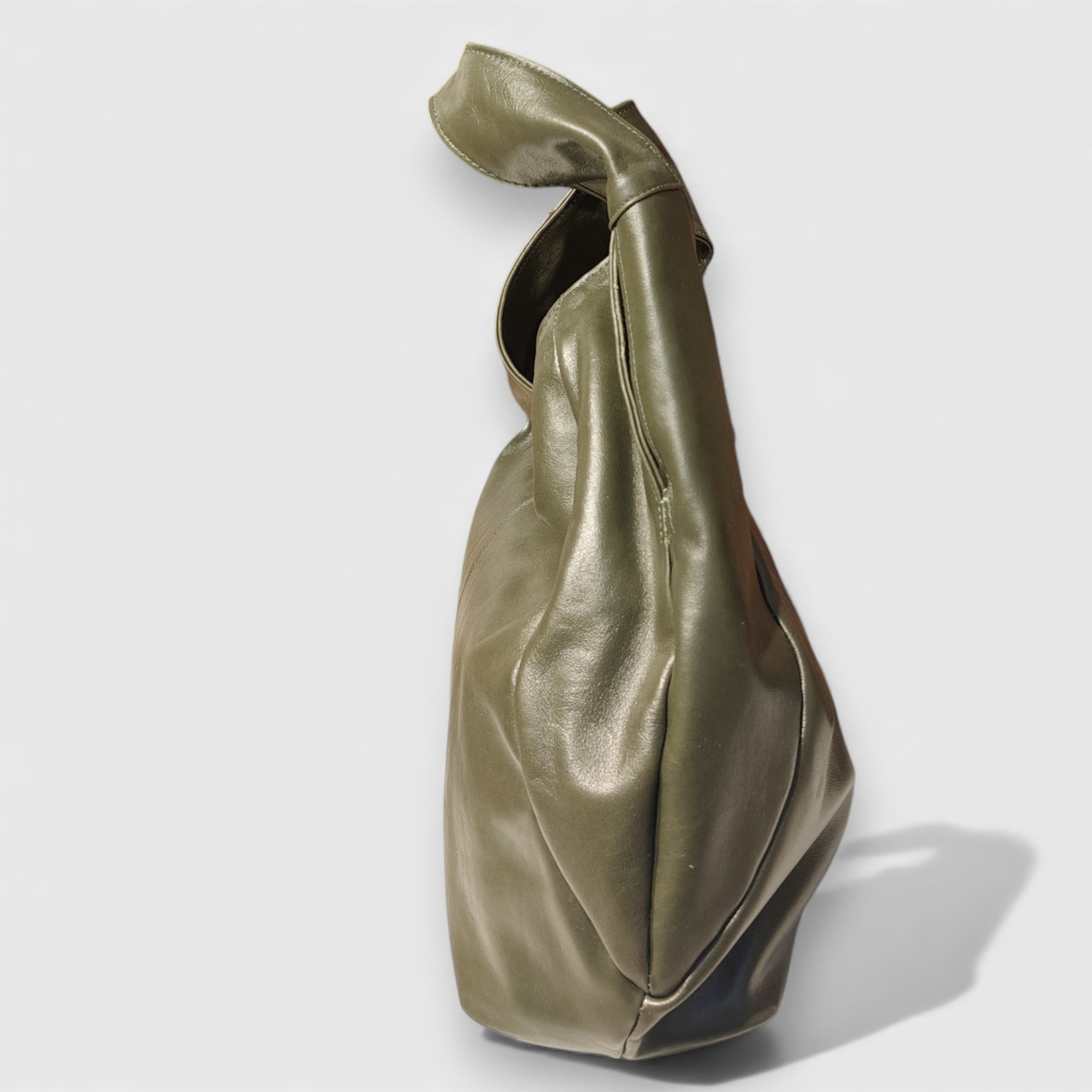 Pelletteria Pelle Nuda Milano, Artigianato Italiano, Vera pelle, Negozio borse donna, Barchetta verde