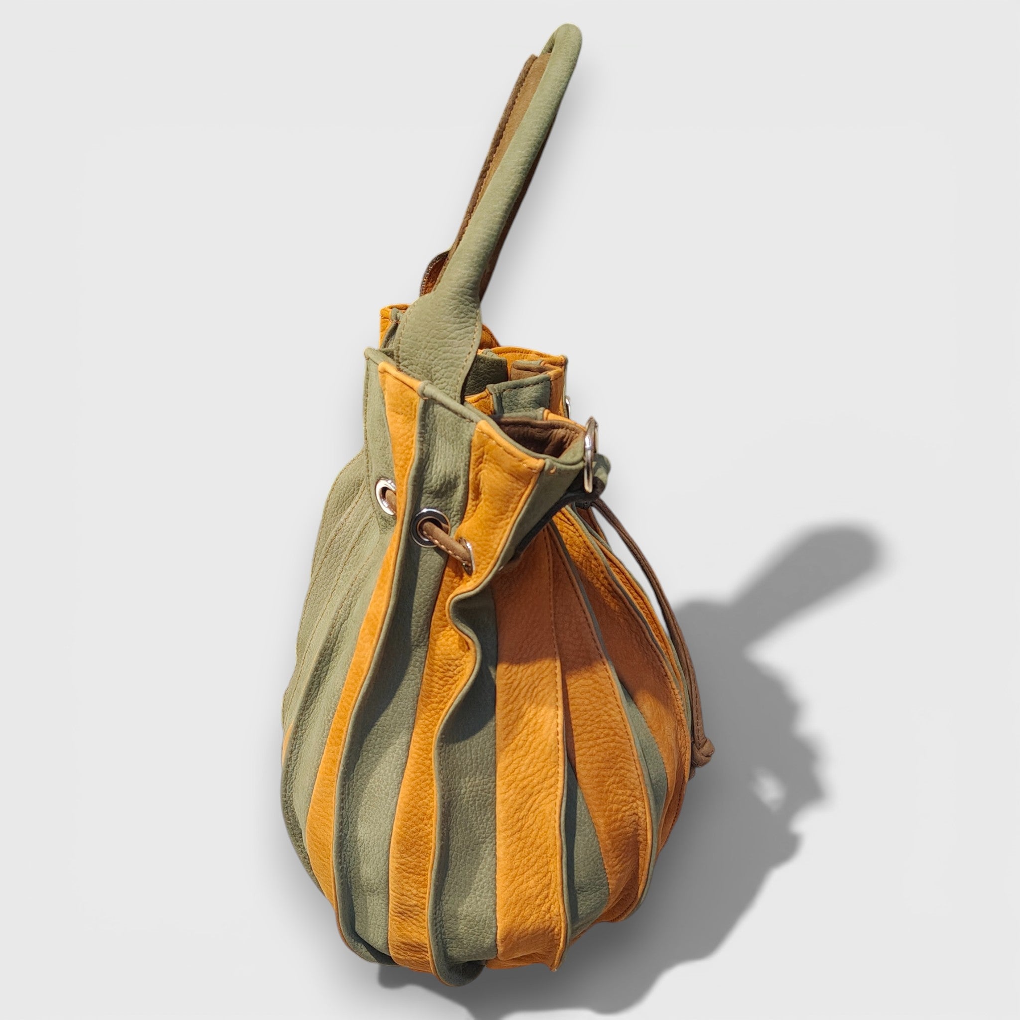 Pelletteria Pelle Nuda Milano, Artigianato italiano, Vera pelle, Negozio borse donna, Caramella verde